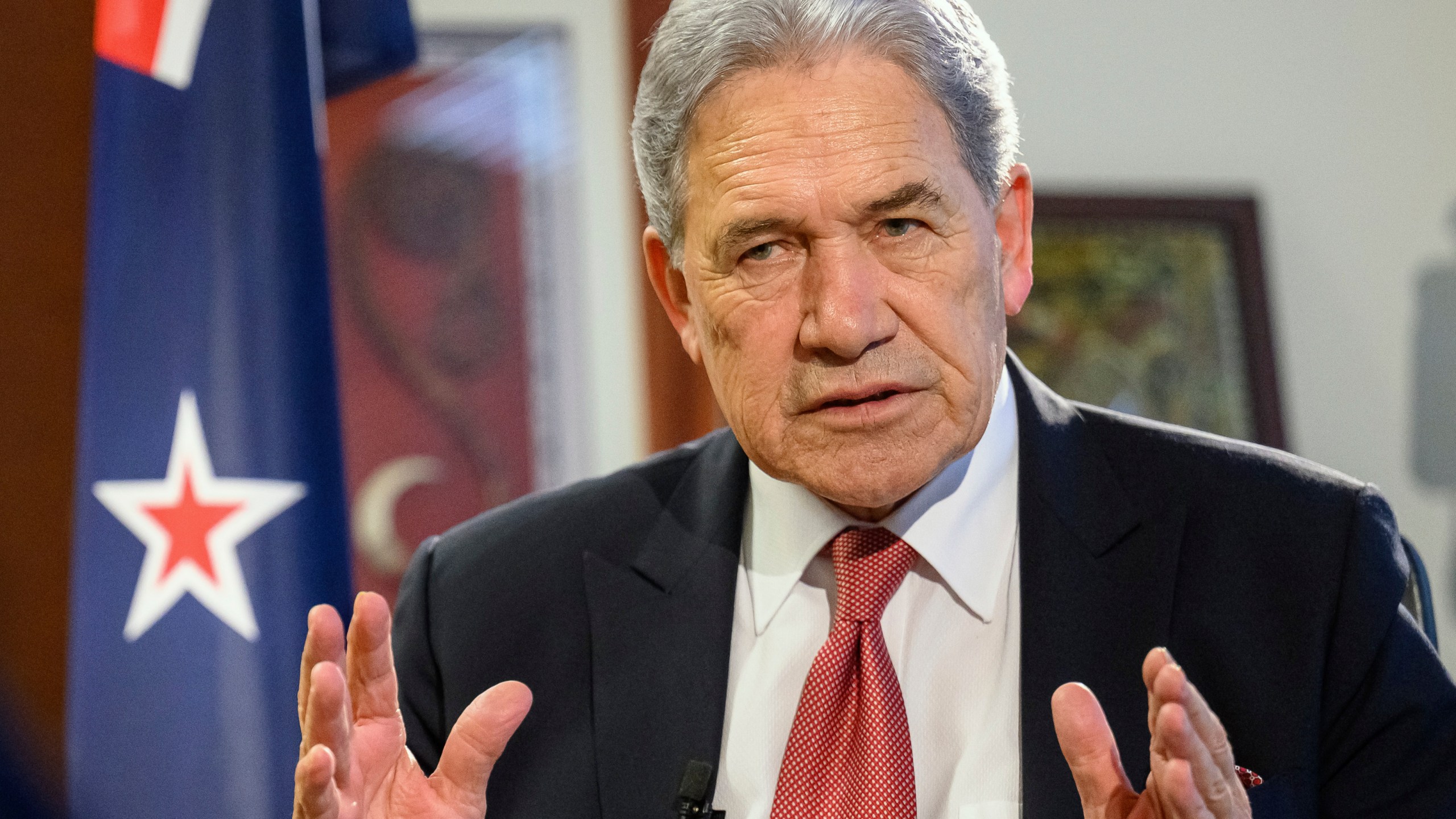 FILE - New Zealand Foreign Minister Winston Peters comments during an interview with The Associated Press in his parliamentary office in the capital, Wellington, Thursday, Aug. 22, 2024. (AP Photo/Mark Tantrum, File)