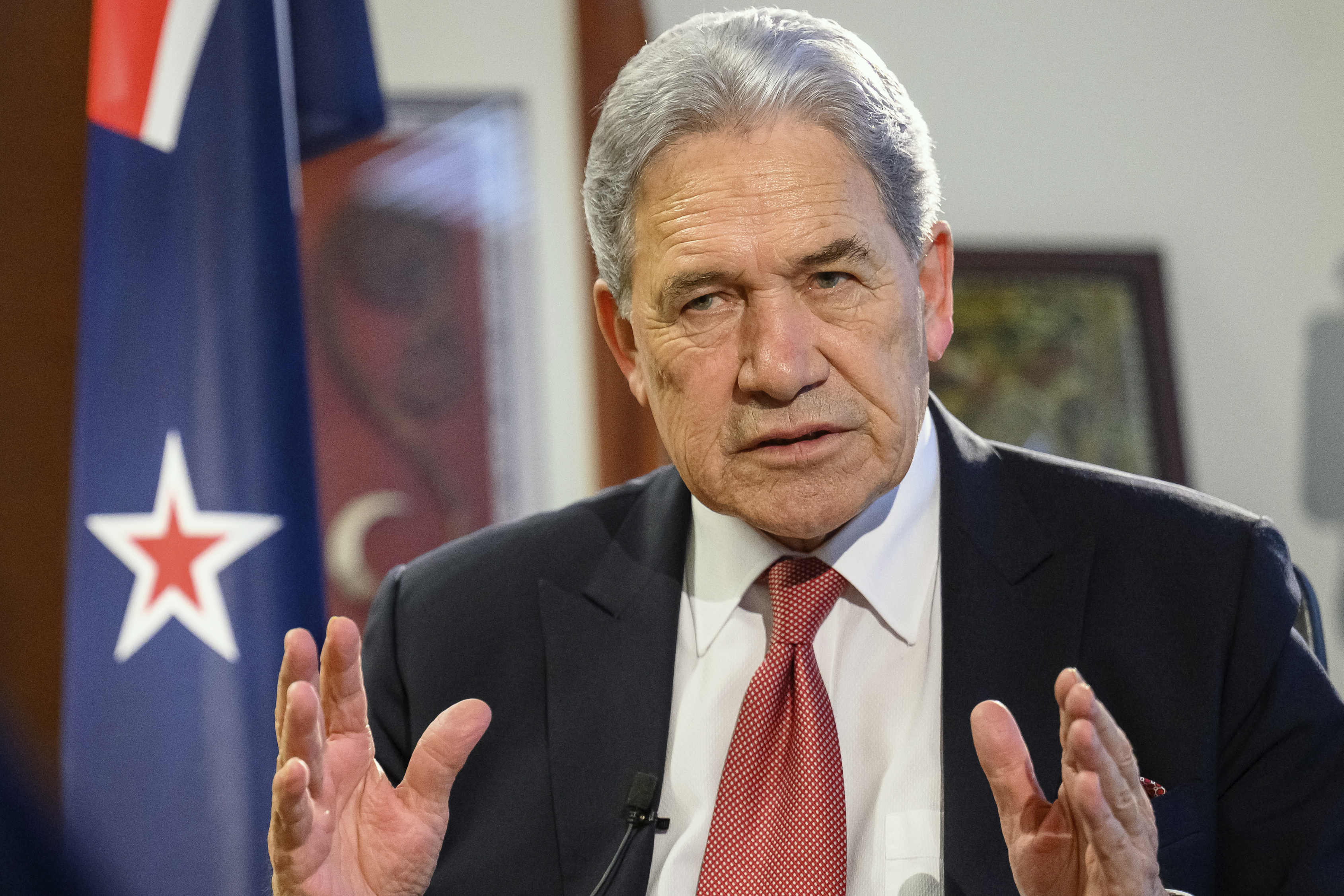 FILE - New Zealand Foreign Minister Winston Peters comments during an interview with The Associated Press in his parliamentary office in the capital, Wellington, Thursday, Aug. 22, 2024. (AP Photo/Mark Tantrum, File)