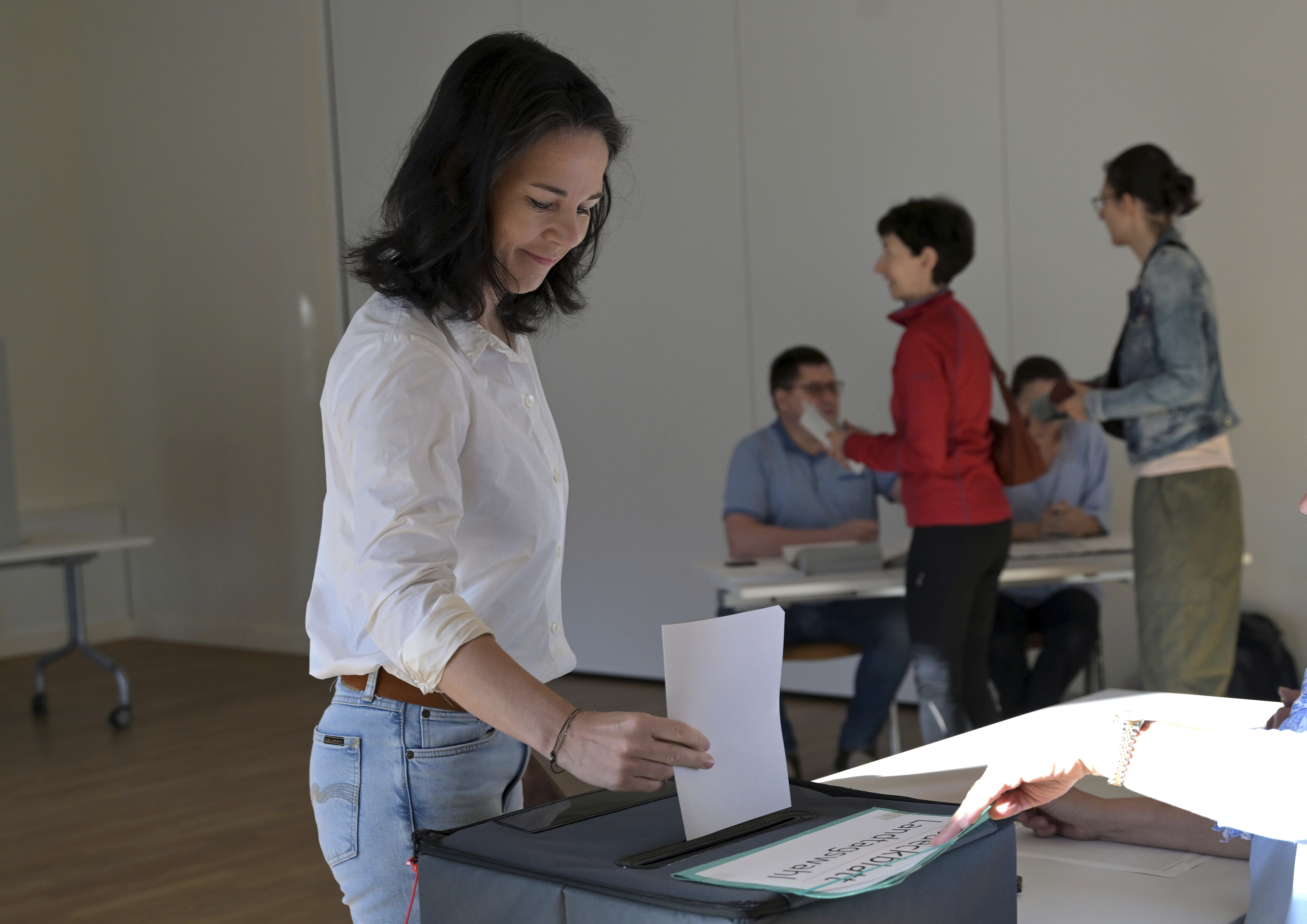 Germany's Foreign Minister Annalena Baerbock votes in the state election in Brandenburg at a polling station in Potsdam, Germany, Sunday Sept. 22, 2024. (Michael Bahlo/dpa via AP)