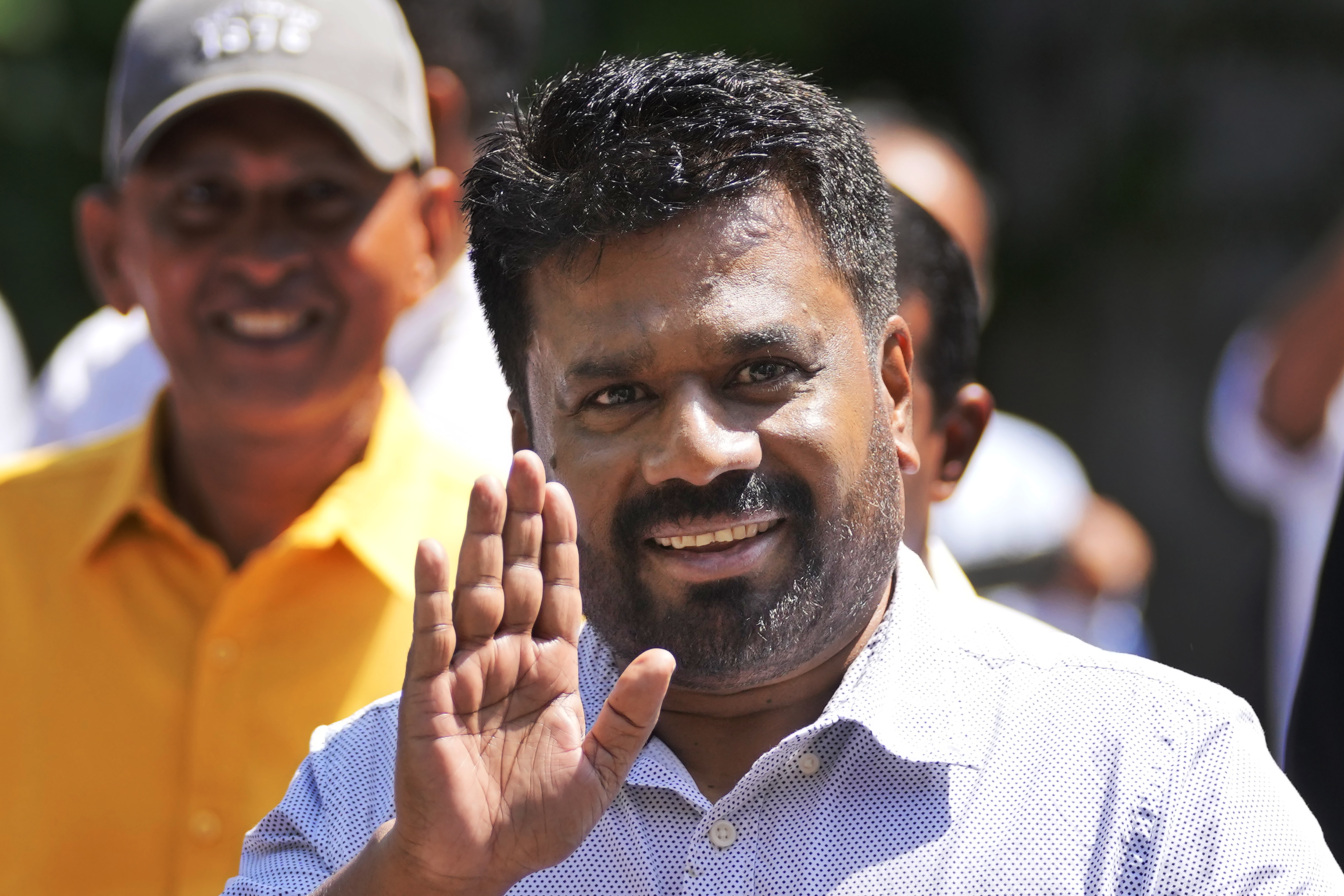 Leader and the presidential candidate of National People's Power Anura Kumara Dissanayake arrives at a polling station to cast his vote in Colombo, Sri Lanka, Saturday, Sept. 21, 2024. (AP Photo/Eranga Jayawardena)