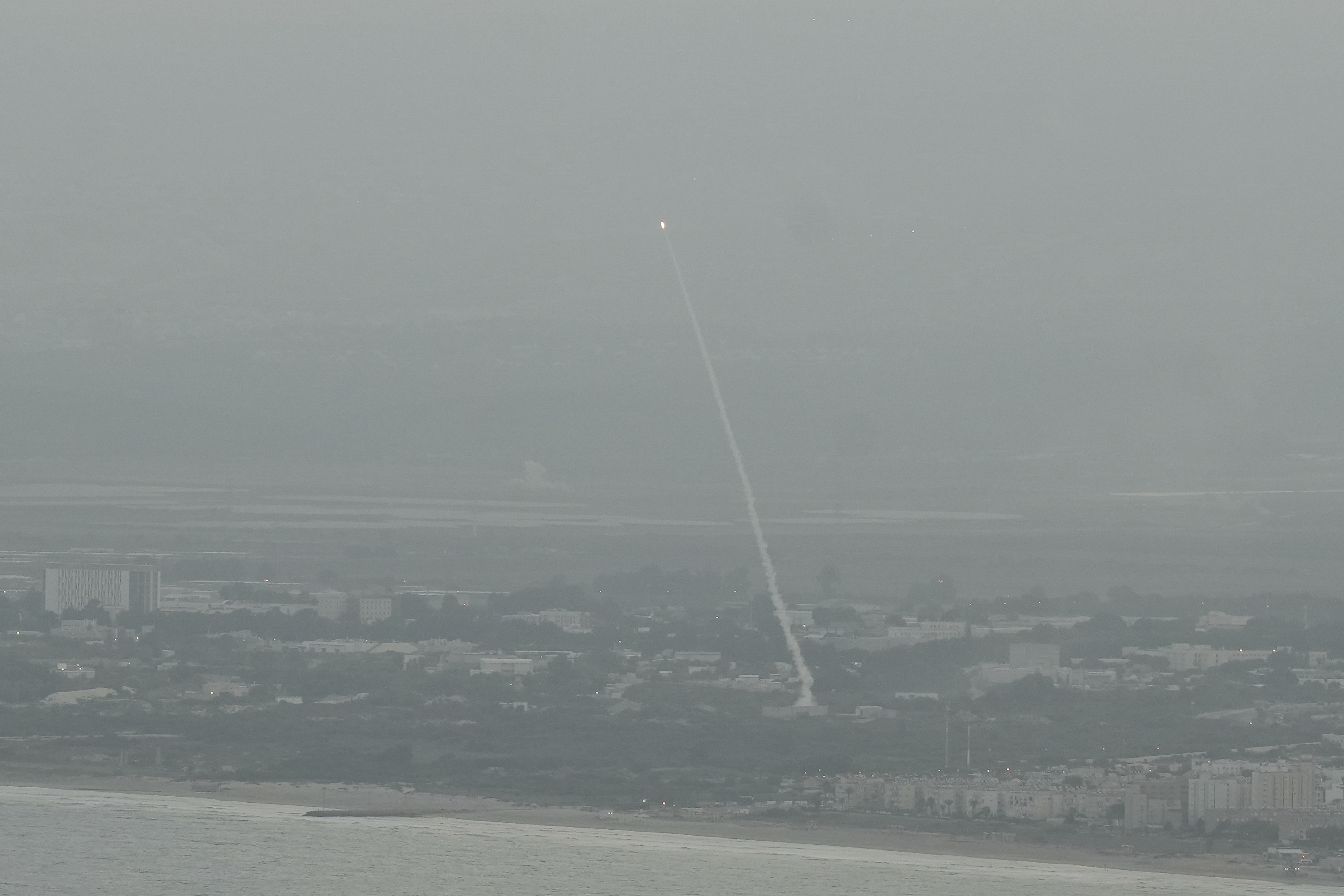 Israeli Iron Dome air defense system fires to intercept rockets that were launched from Lebanon, in northern Israel, Sunday, Sept. 22, 2024. (AP Photo/Baz Ratner)