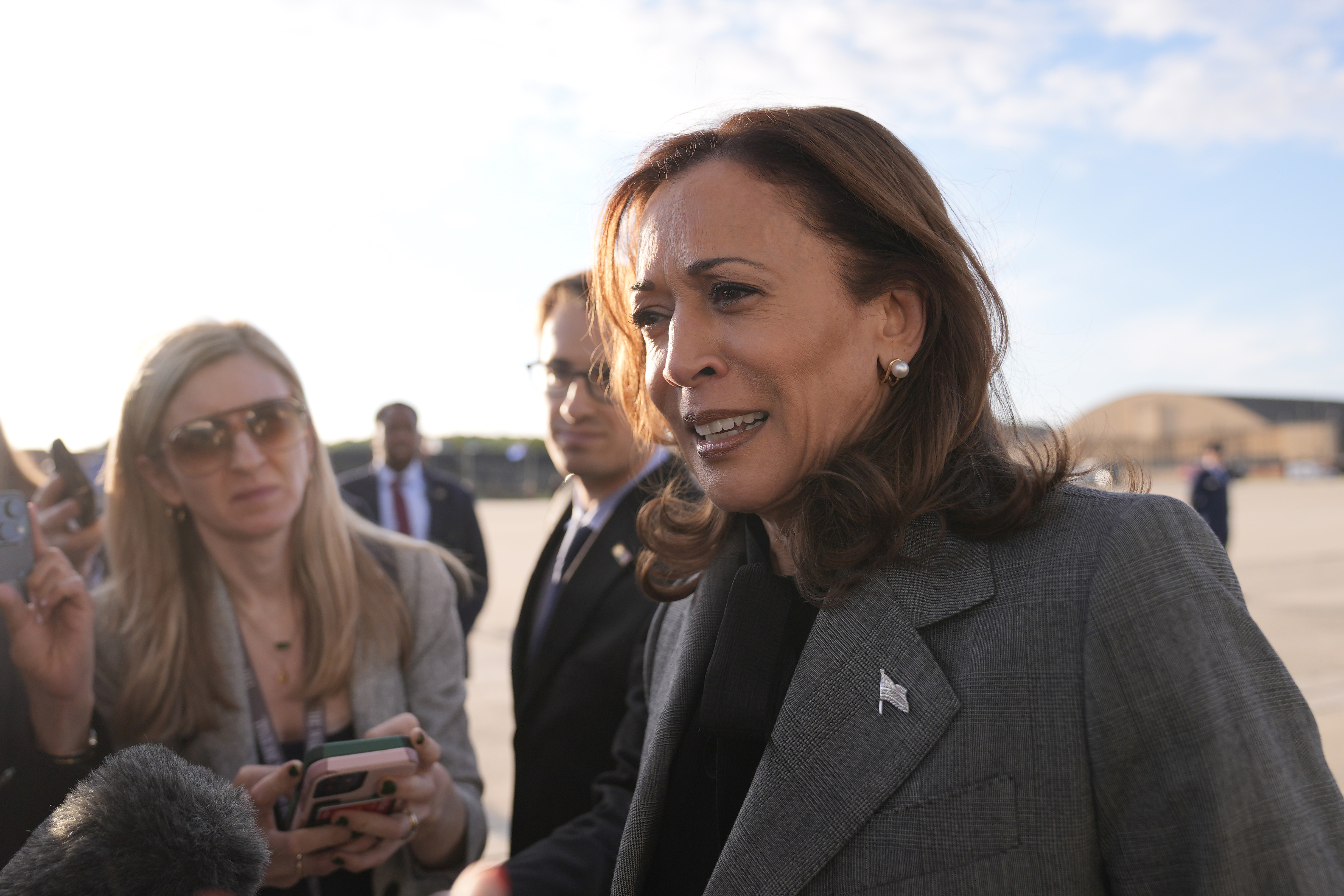 Democratic presidential nominee Vice President Kamala Harris speaks to members of the media upon her arrival at Andrews Air Force Base, Md., Sunday, Sept. 22, 2024. (AP Photo/Matt Rourke/Pool)