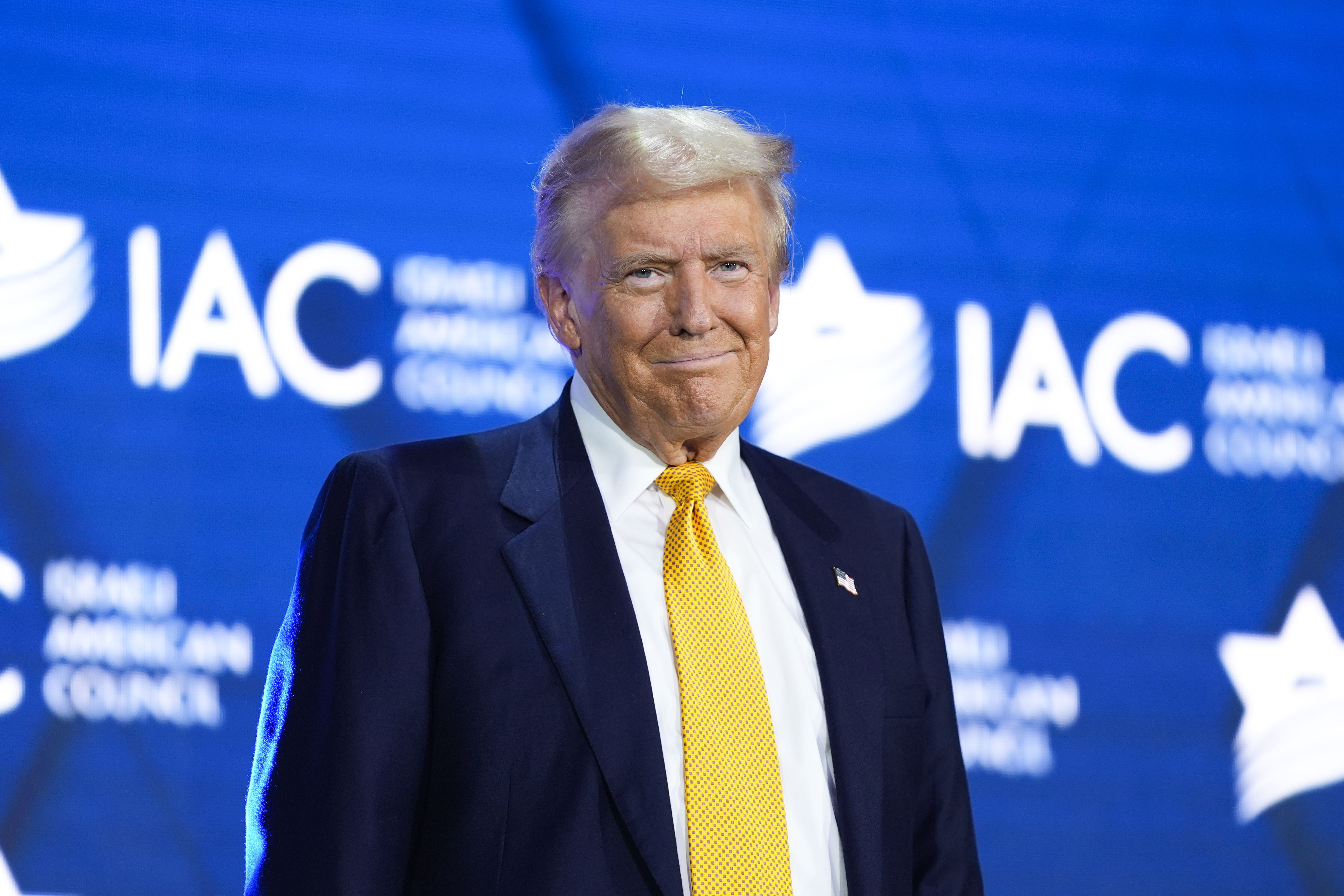 Republican presidential candidate former President Donald Trump arrives to speak at the Israeli American Council National Summit, Thursday, Sept. 19, 2024, in Washington. (AP Photo/Evan Vucci)