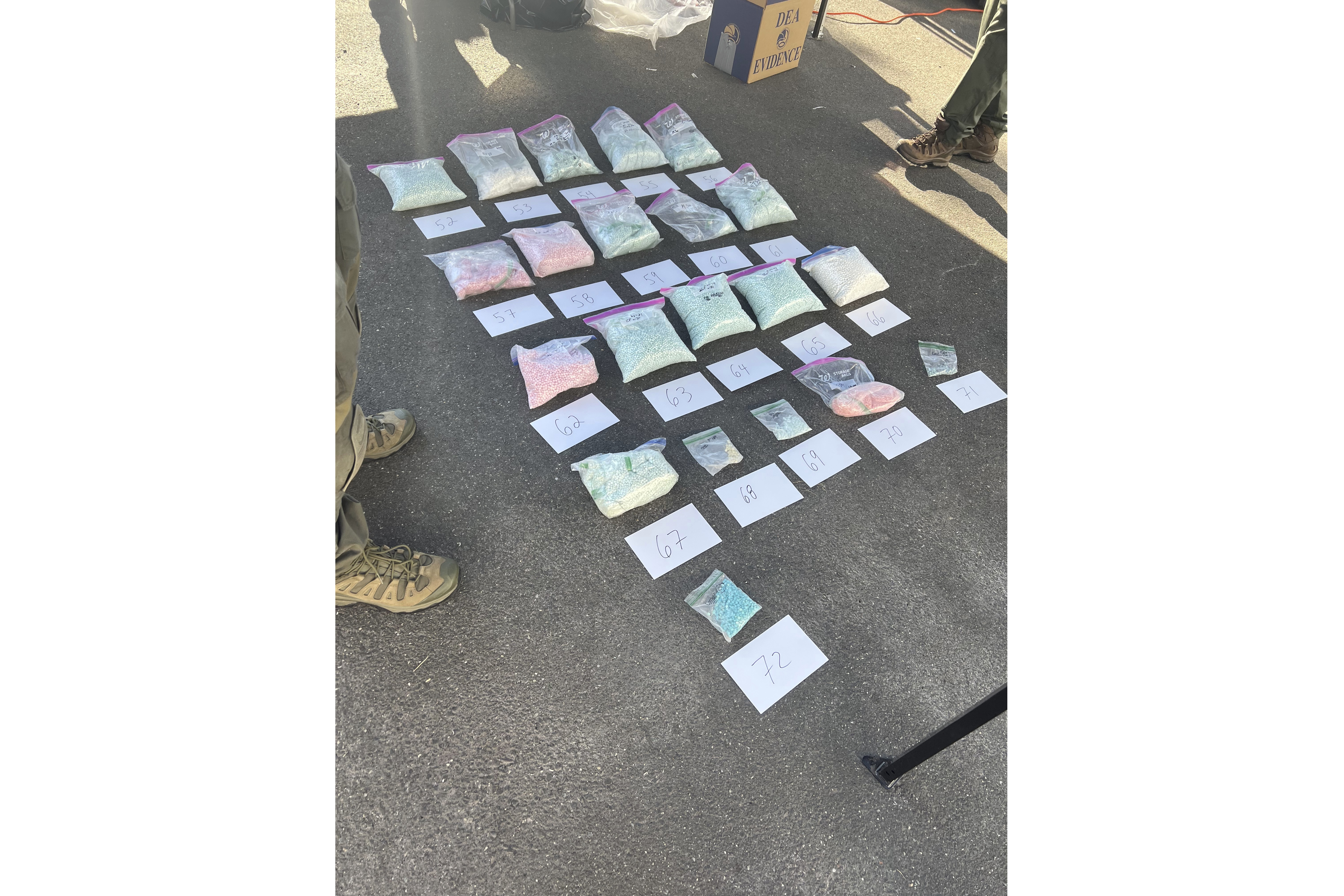 In this photo released by the U.S. Attorney's Office Connecticut, seized counterfeit pills are displayed Sept. 5, 2024, in East Have, Ct. ( U.S. Attorney's Office Connecticut via AP)