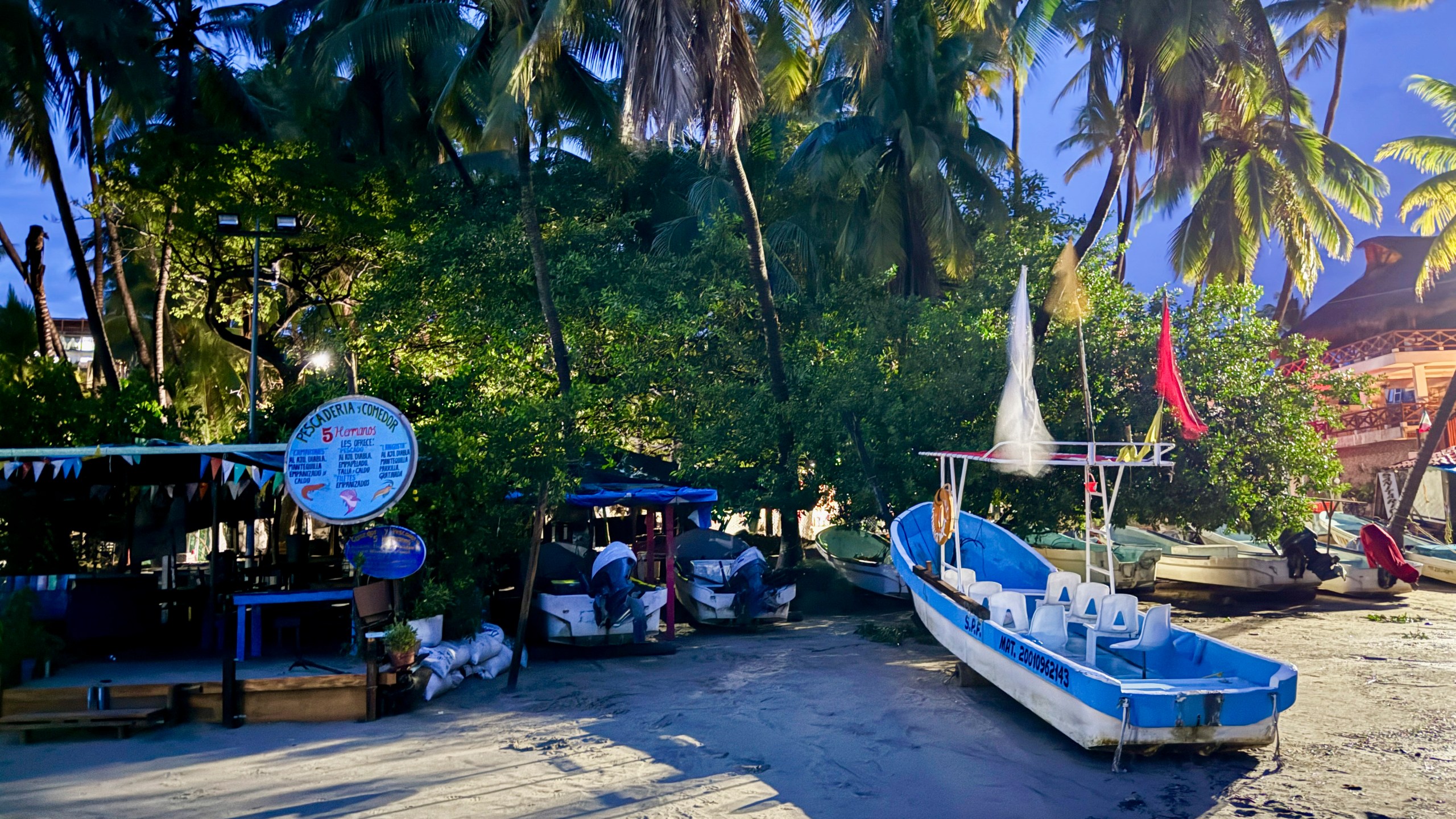 Boats are stored on the beach for protection ahead of the anticipated arrival of Tropical Storm John in Puerto Escondido, Mexico, Monday, Sept. 23, 2024. (AP Photo/Luis Alberto Cruz)