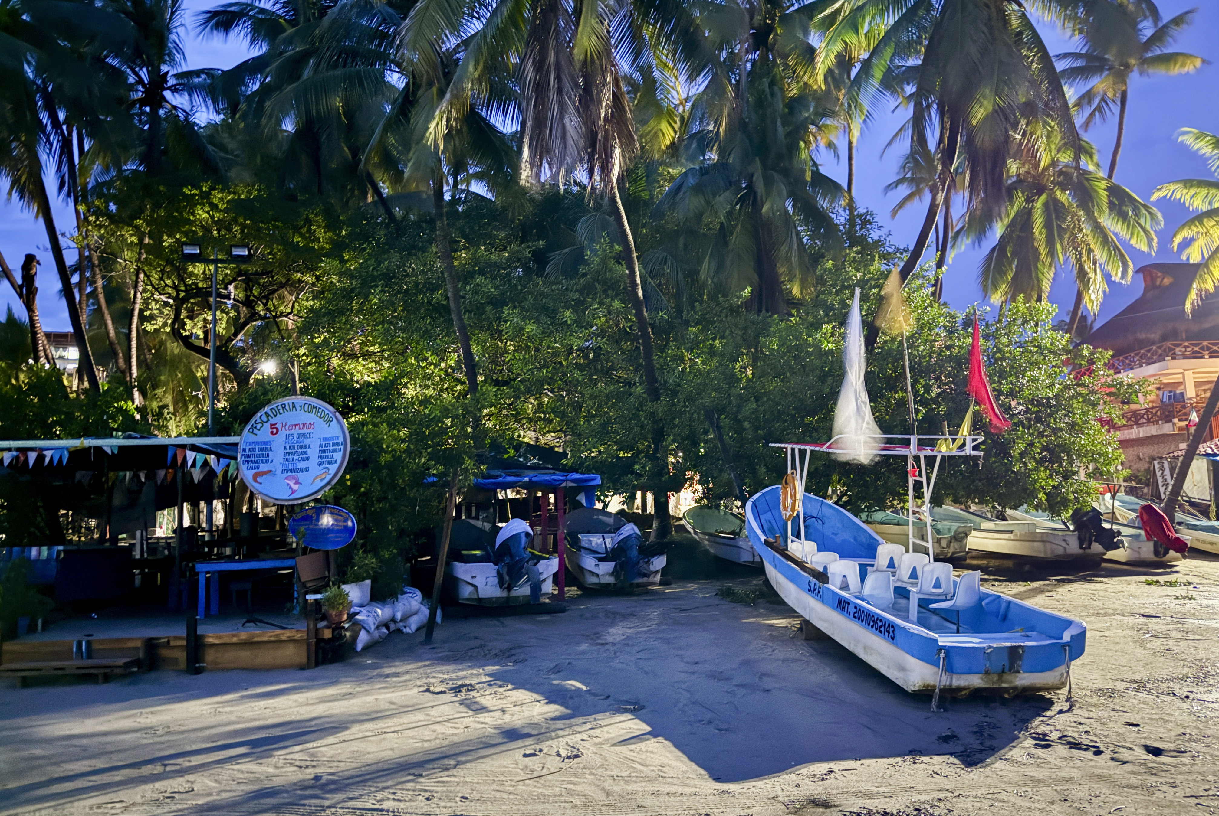 Boats are stored on the beach for protection ahead of the anticipated arrival of Tropical Storm John in Puerto Escondido, Mexico, Monday, Sept. 23, 2024. (AP Photo/Luis Alberto Cruz)