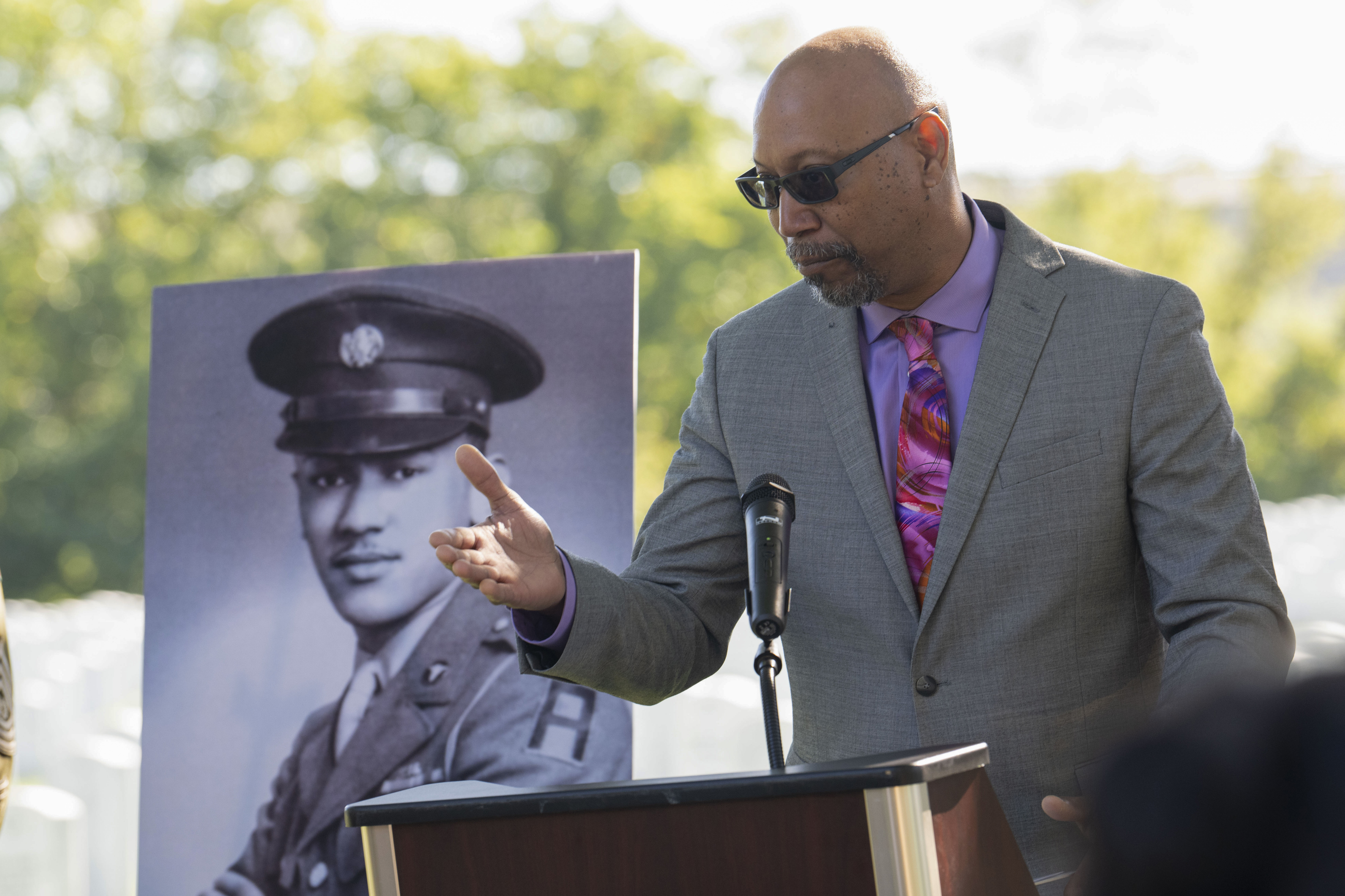 FILE - Steve Woodson speaks during a medal ceremony for his father, Cpl. Waverly B. Woodson Jr., to be posthumously honored with the Bronze Star and Combat Medic Badge on Oct. 11, 2023 at Arlington National Cemetery in Arlington, Va. (AP Photo/Kevin Wolf, File)