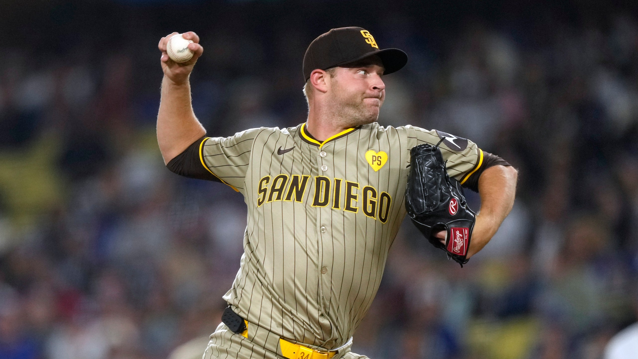 San Diego Padres starting pitcher Michael King throws to the plate during the first inning of a baseball game against the Los Angeles Dodgers, Tuesday, Sept. 24, 2024, in Los Angeles. (AP Photo/Mark J. Terrill)