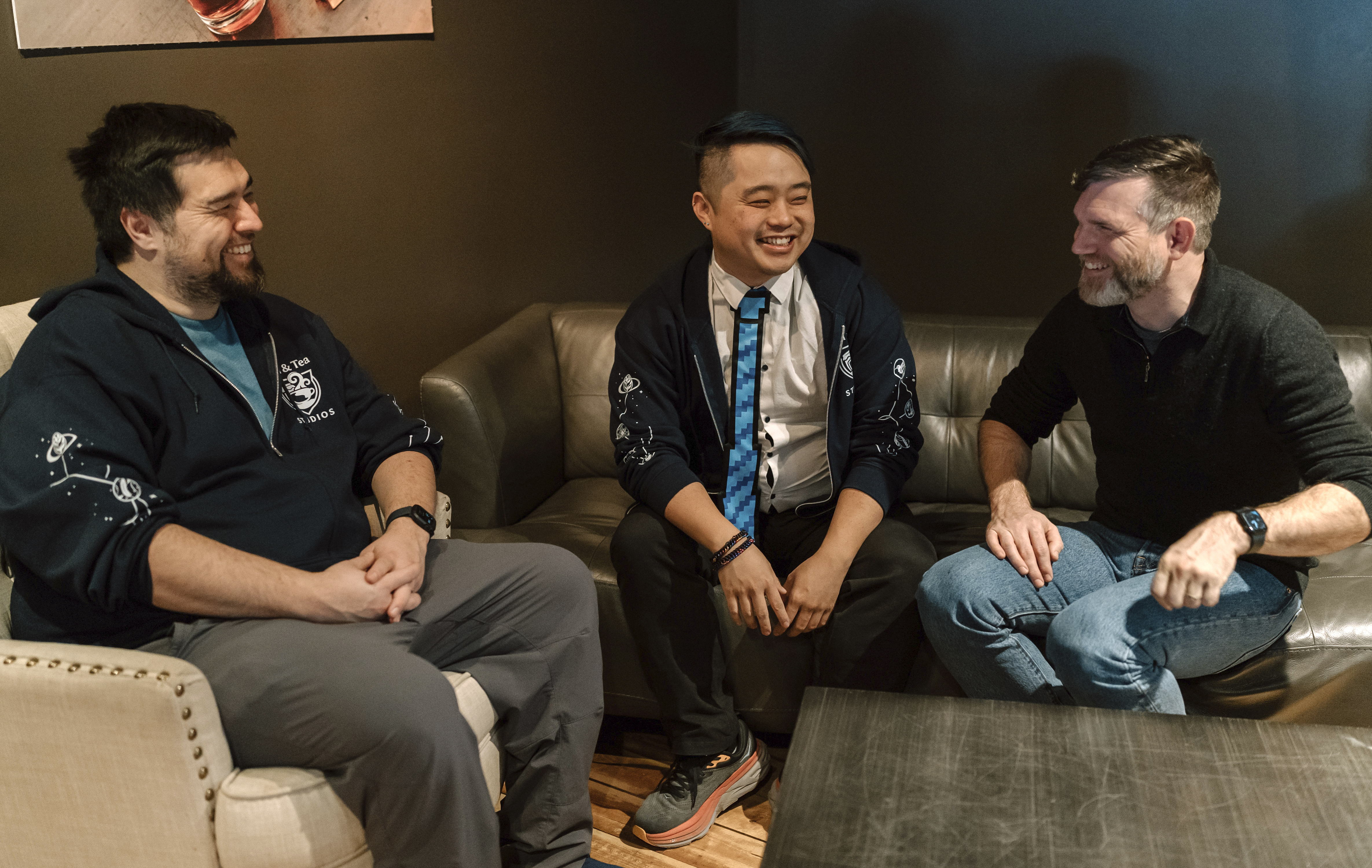 Jam & Tea Studios founders, left to right, Michael Yichao, Carl Kwoh, and J. Aaron Farr sit for photos on Jan. 18, 2024, in Roslyn, Wash. (Lutisha Aubrey Photography via AP)