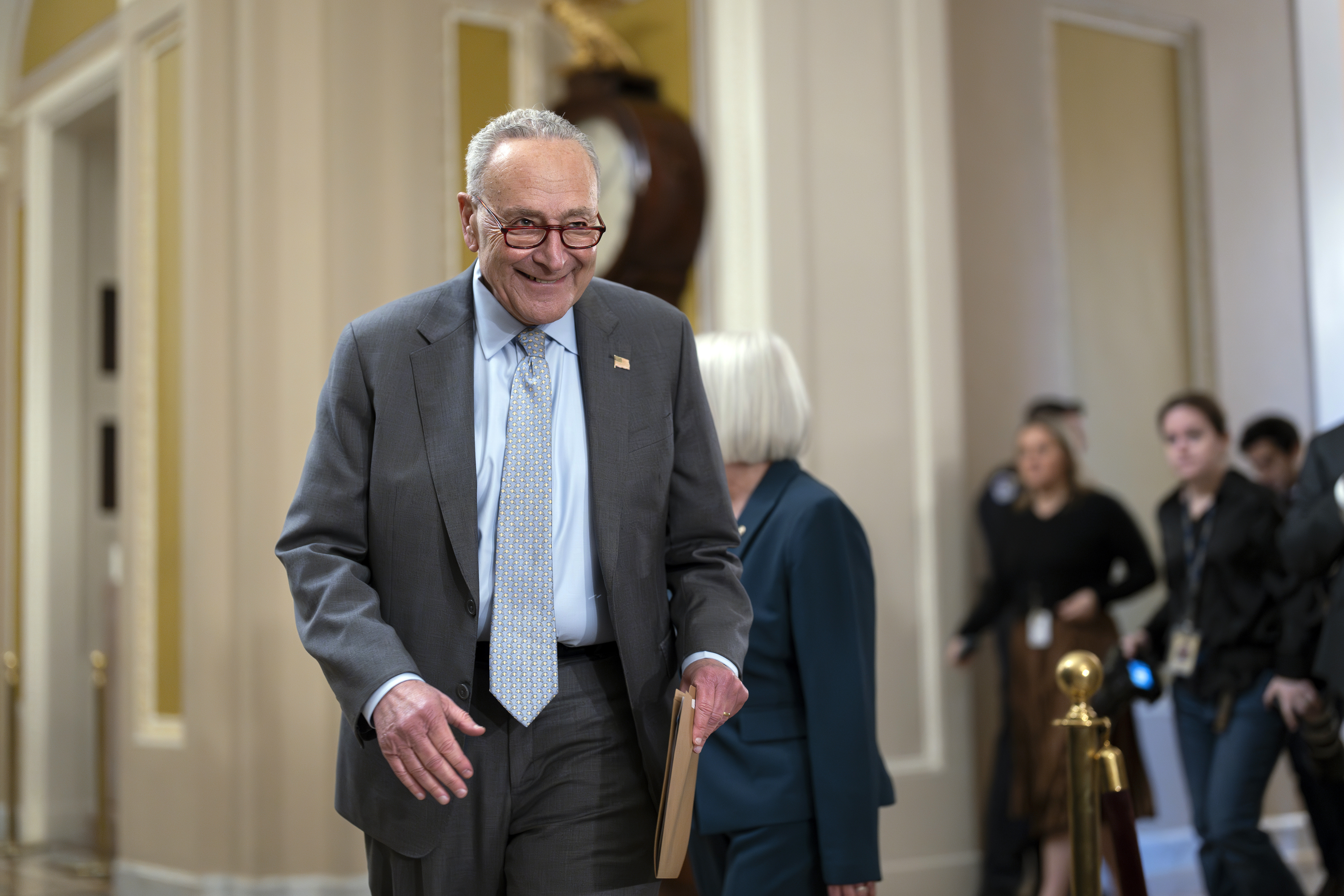 Senate Majority Leader Chuck Schumer, D-N.Y., arrives to speak to reporters after a lunch meeting, at the Capitol in Washington, Tuesday, Sept. 24, 2024. (AP Photo/J. Scott Applewhite)