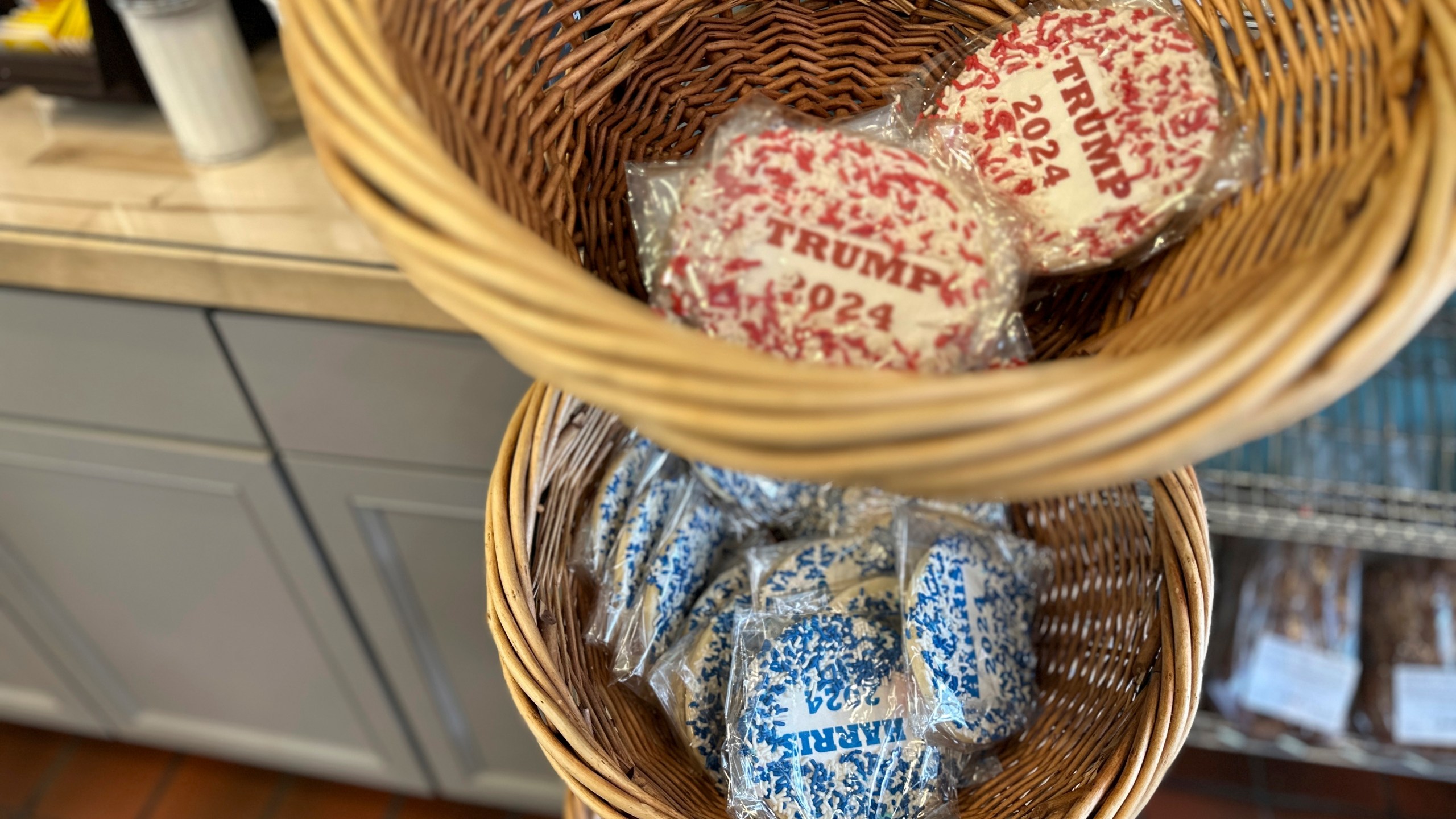 Cookies, with Harris and Trump labels on, are on display at Lochel's Bakery in the town of Hatboro in suburban Philadelphia, Tuesday, Sept. 24, 2024. Lochel's Bakery started the election cookie poll in 2008 as a joke between the third-generation bakery owners and their local customers. (AP Photo/Tassanee Vejpongsa)