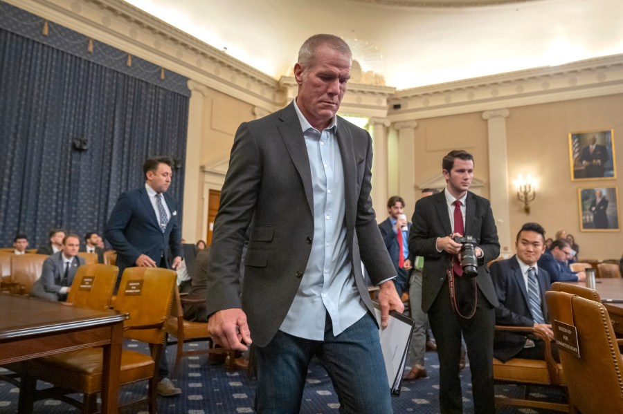 Former NFL quarterback Brett Favre arrives to appear before the House Committee on Ways and Means on Capitol Hill, Tuesday, Sept. 24, 2024, in Washington. (AP Photo/Mark Schiefelbein)