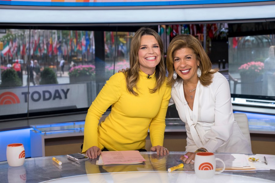 FILE - Co-anchors Savannah Guthrie, left, and Hoda Kotb pose on set of the "Today" show at NBC Studios on Wednesday, June 27, 2018, in New York. (Photo by Charles Sykes/Invision/AP, File)