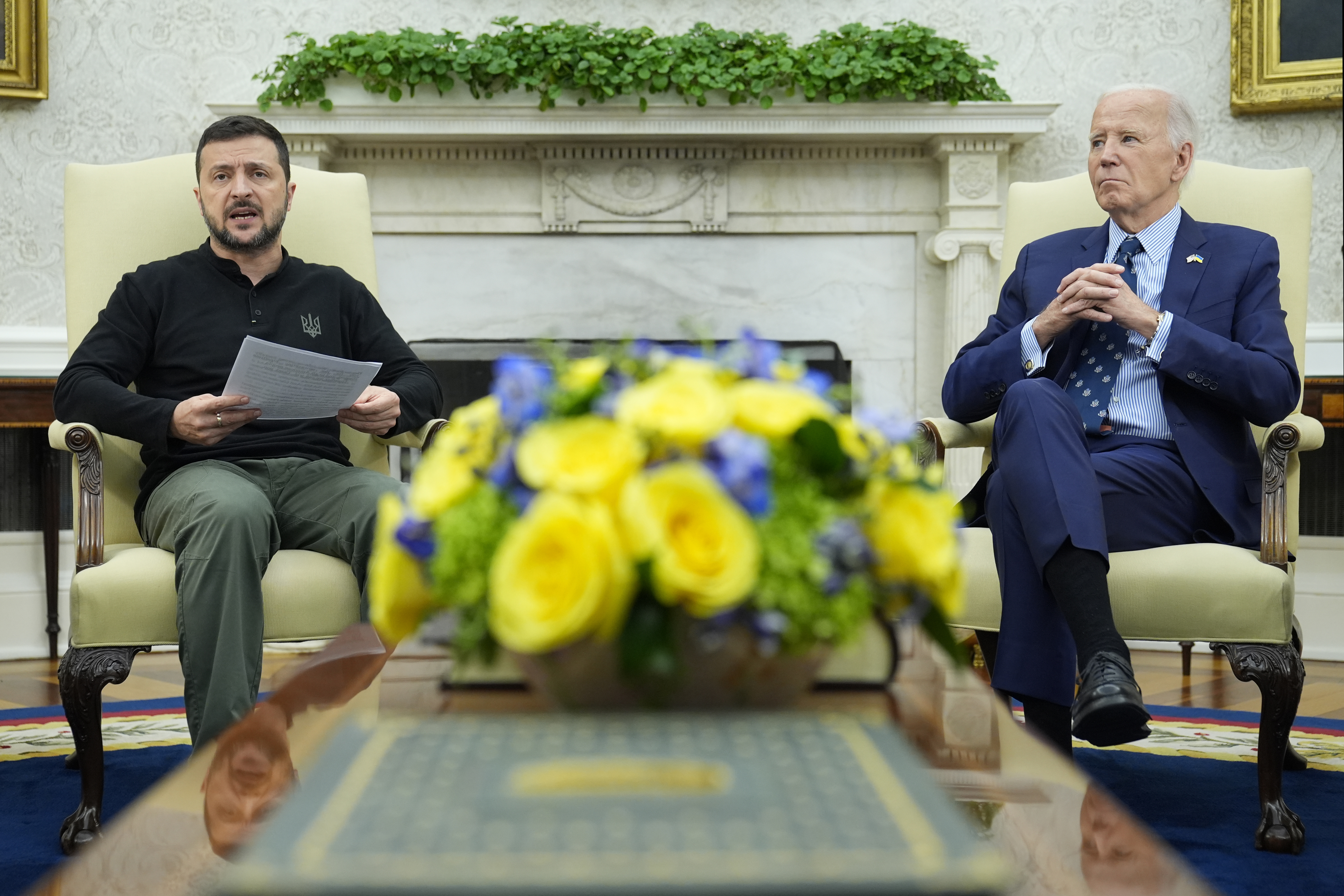 President Joe Biden, right, listens as Ukraine's President Volodymyr Zelenskyy, left, speaks during their meeting in the Oval Office of the White House in Washington, Thursday, Sept. 26, 2024. (AP Photo/Susan Walsh)