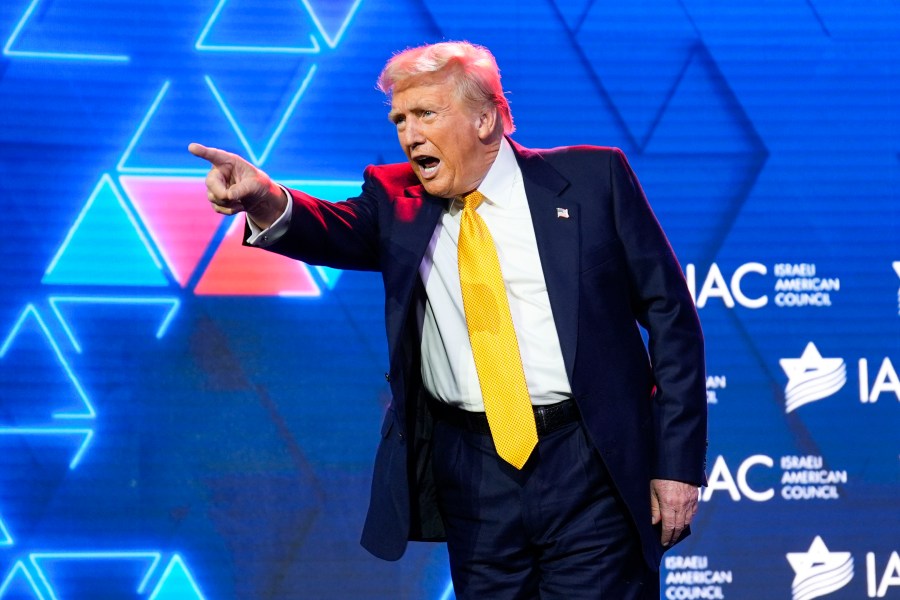 Republican presidential nominee former President Donald Trump acknowledges the crowd after speaking at the Israeli American Council National Summit, Thursday, Sept. 19, 2024, in Washington. (AP Photo/Evan Vucci)