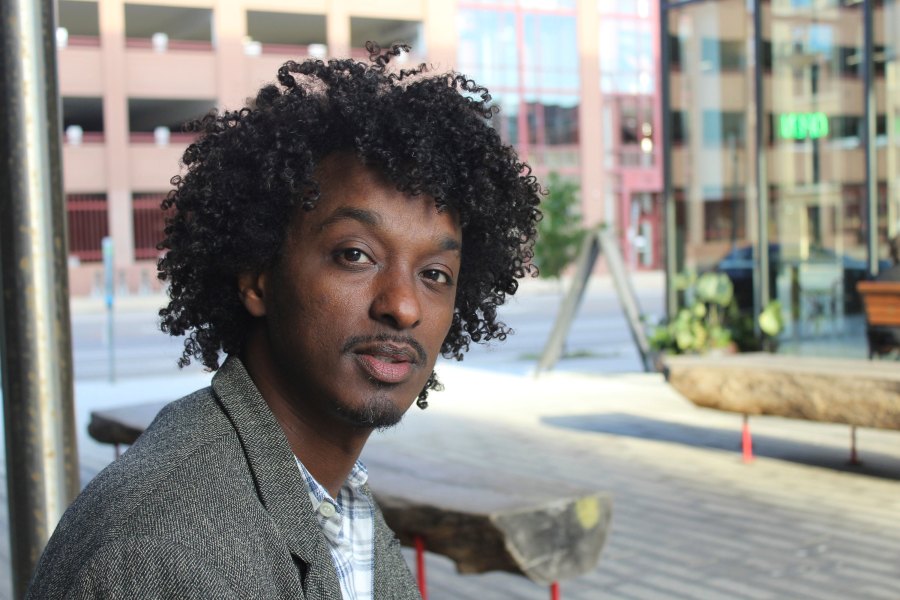 FILE - K'naan poses in Minneapolis on Oct. 22, 2016. (AP Photo/Jeff Baenen, File)