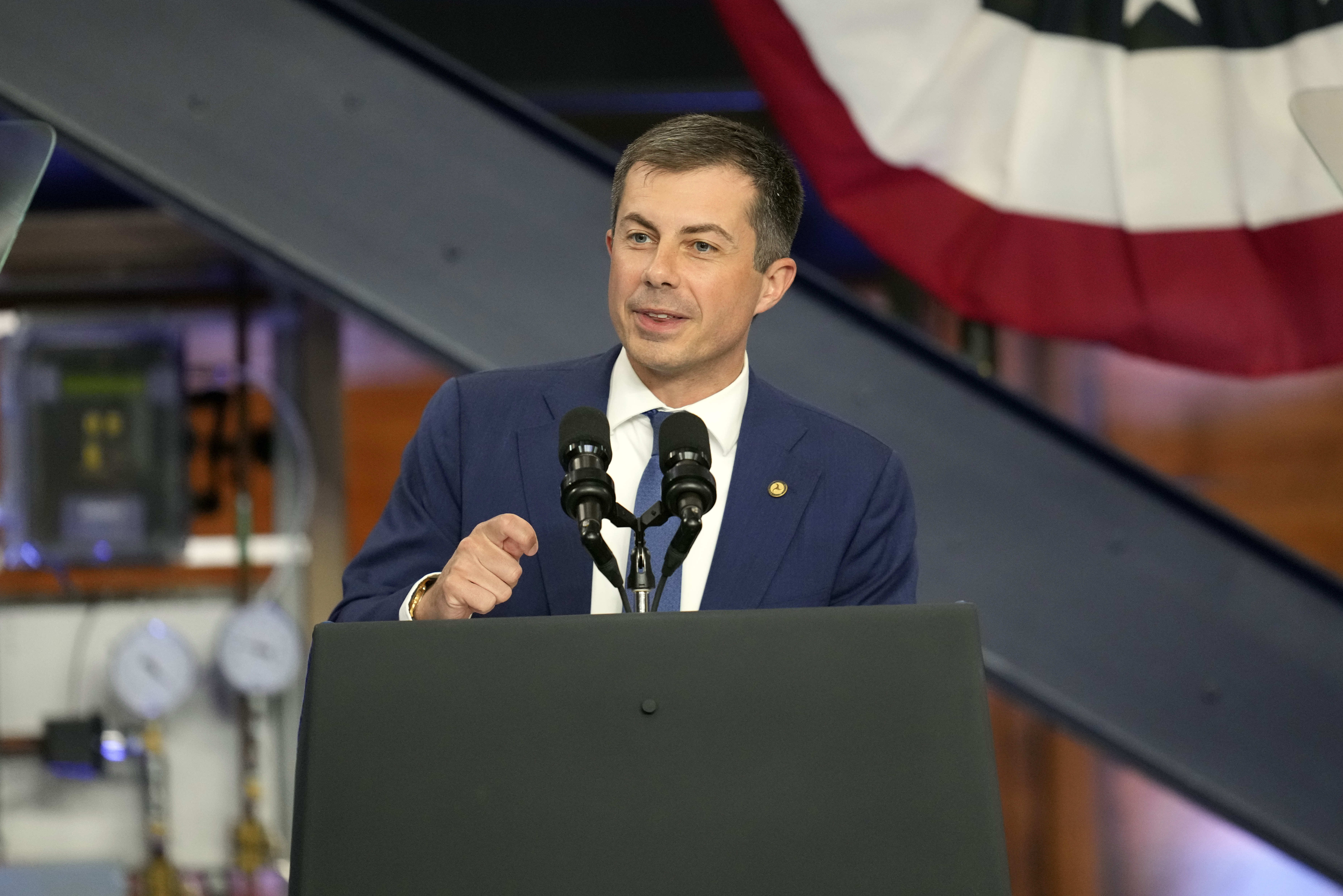 Transportation Secretary Pete Buttigieg speaks before President Joe Biden during a visit to the U.A. Local 190 Training Center in Ann Arbor, Mich., Friday, Sept. 6, 2024. (AP Photo/Paul Sancya)