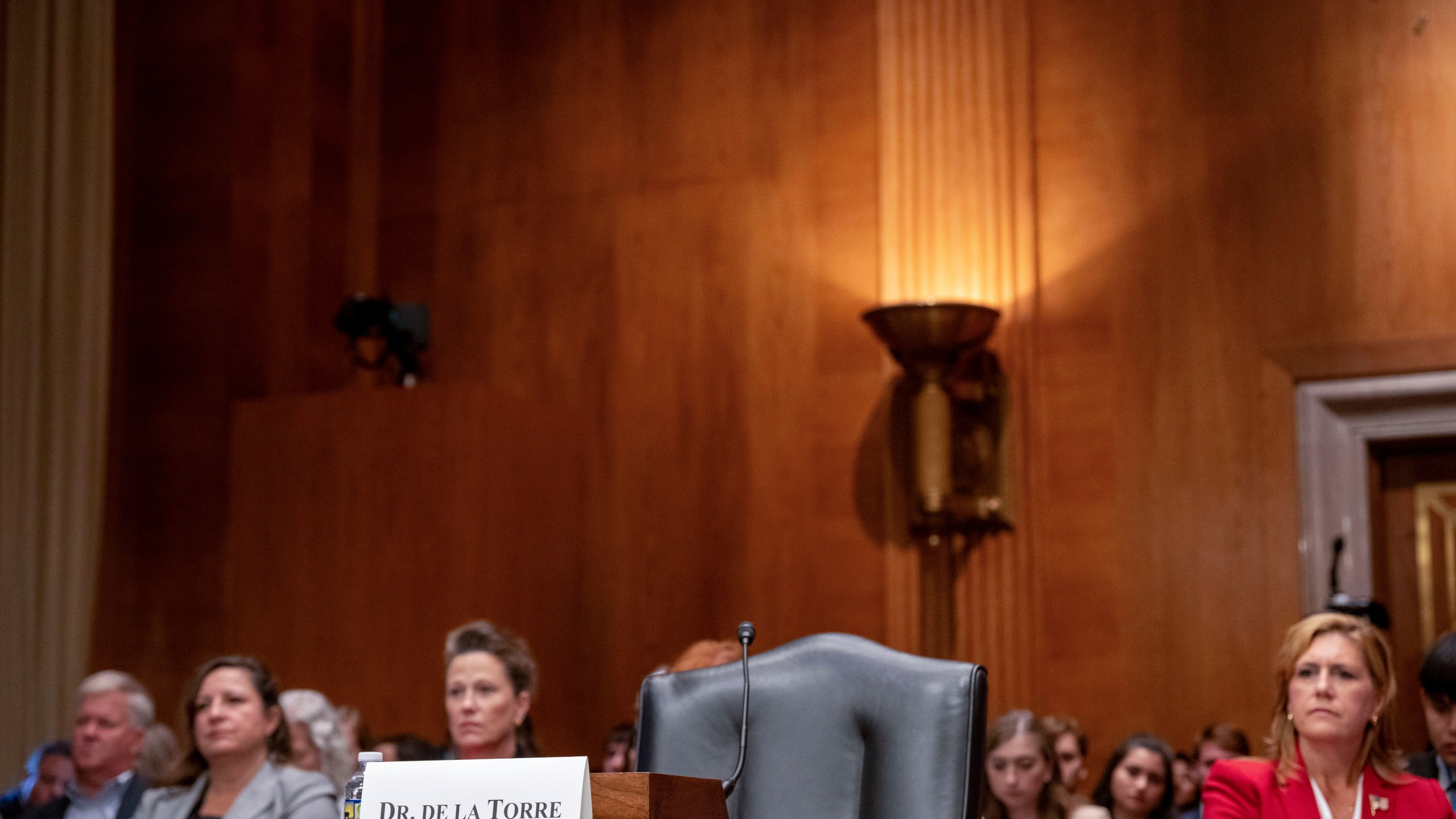 The chair reserved for Steward Health Care System CEO Ralph de la Torre sits empty after de la Torre failed to show and testify before the Senate Health, Education, Labor, and Pensions hearing to examine the bankruptcy of Steward Health Care on Thursday, Sept. 12, 2024 on Capitol Hill in Washington. (AP Photo/Kevin Wolf)