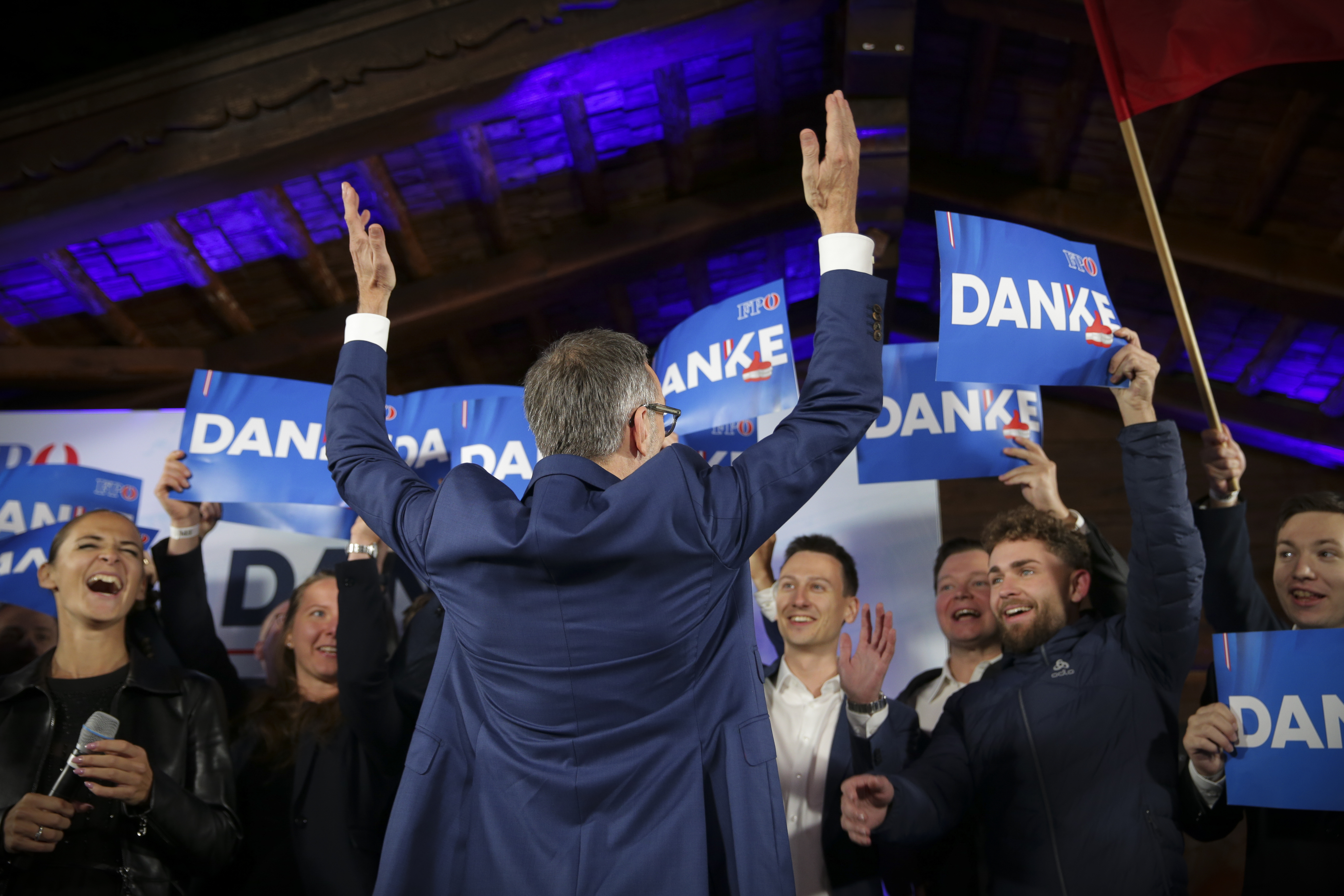 Herbert Kickl, leader of the Freedom Party of Austria cheers with supporters, in Vienna, Austria, Sunday, Sept. 29, 2024, after polls closed in the country's national election. (AP Photo/Heinz-Peter Bader)