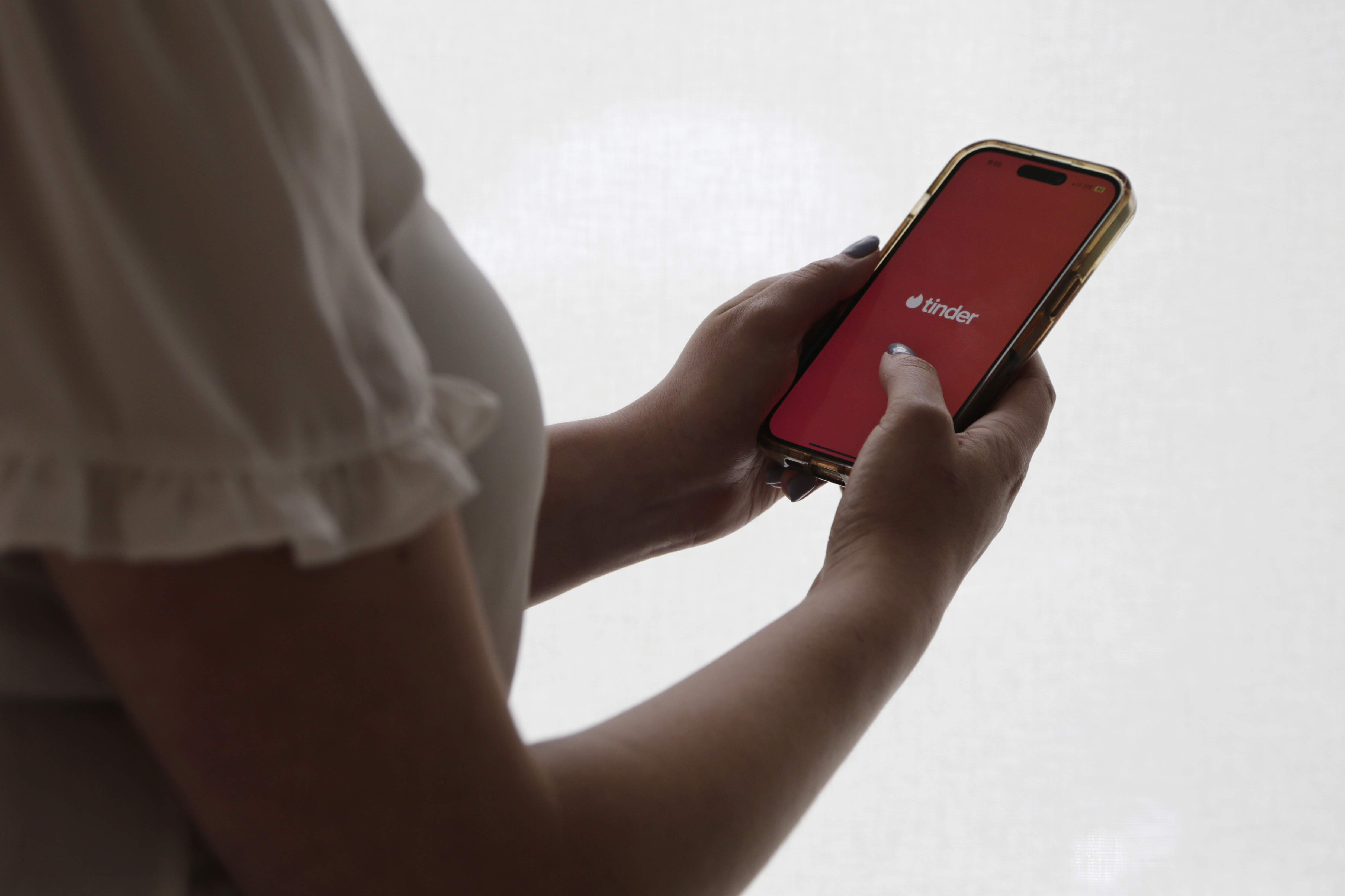 FILE - The dating app Tinder is shown on a smartphone on June 26, 2024, in New York. (AP Photo/Peter Morgan, File)