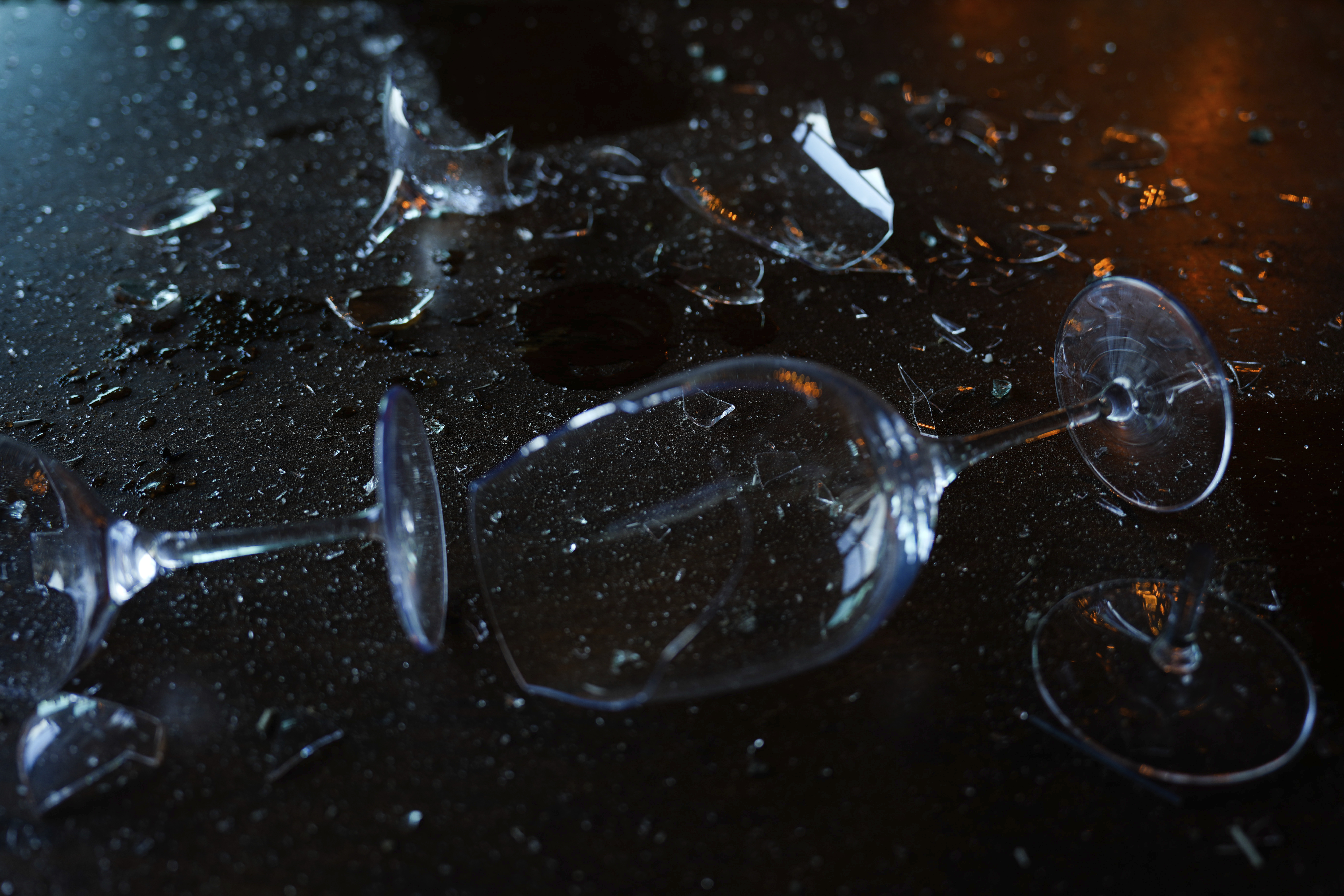 Broken wine glasses are seen in a damaged restaurant that was hit during Iran's missile attack in Tel Aviv, Israel, Wednesday, Oct. 2, 2024. (AP Photo/Ariel Schalit)