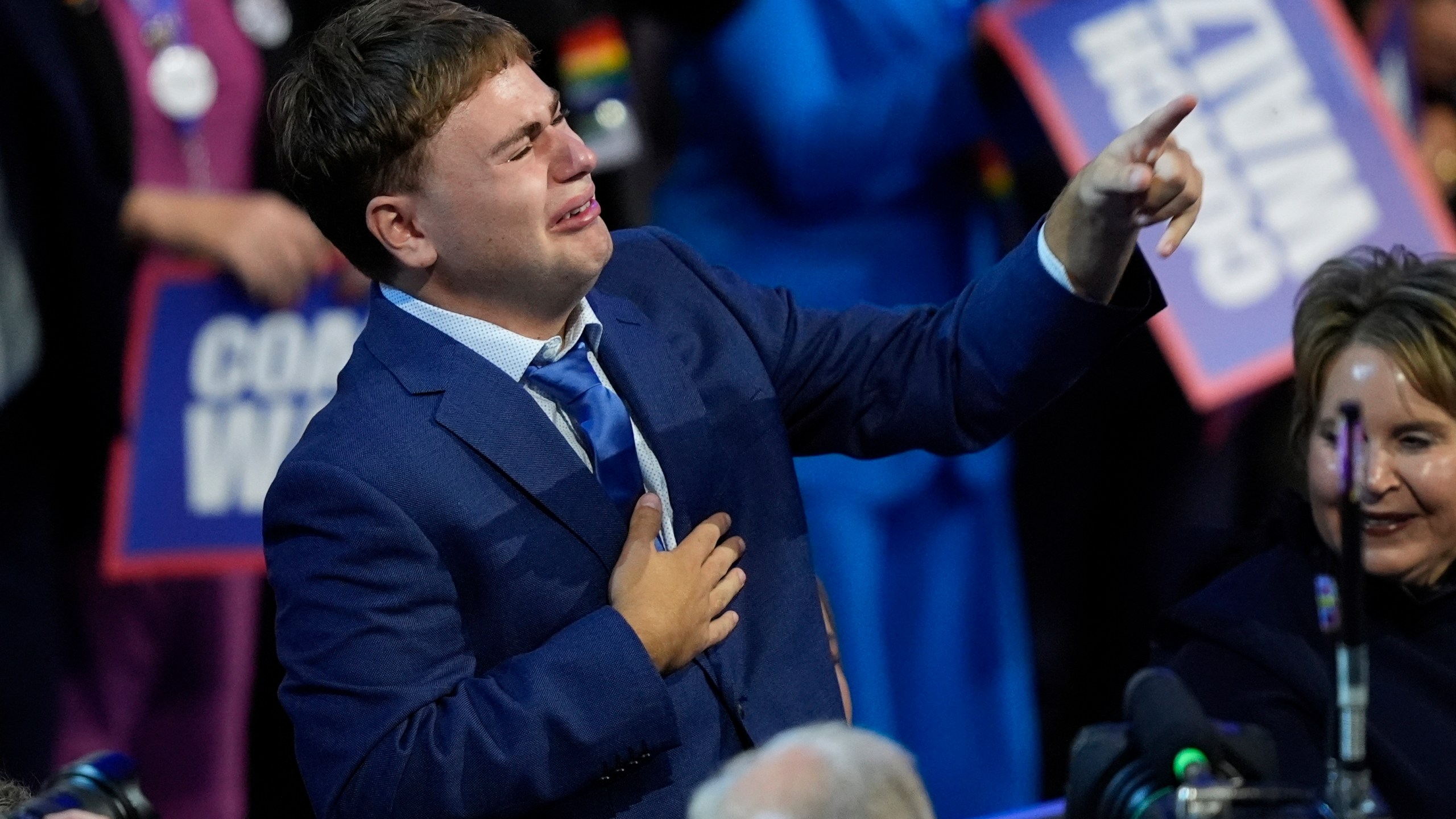 FILE - Gus Walz cries as his father Democratic vice presidential nominee Minnesota Gov. Tim Walz speaks during the Democratic National Convention Wednesday, Aug. 21, 2024, in Chicago. (AP Photo/Charles Rex Arbogast, File)