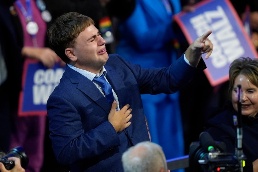 FILE - Gus Walz cries as his father Democratic vice presidential nominee Minnesota Gov. Tim Walz speaks during the Democratic National Convention Wednesday, Aug. 21, 2024, in Chicago. (AP Photo/Charles Rex Arbogast, File)