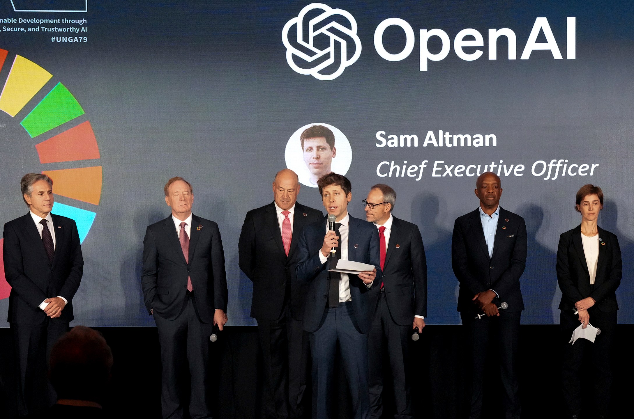 FILE - Open AI Chief Executive Officer Sam Altman, center, speaks at the Advancing Sustainable Development through Safe, Secure, and Trustworthy AI Event on Sept. 23, 204, in New York. (Bryan R. Smith/Pool Photo via AP, File)