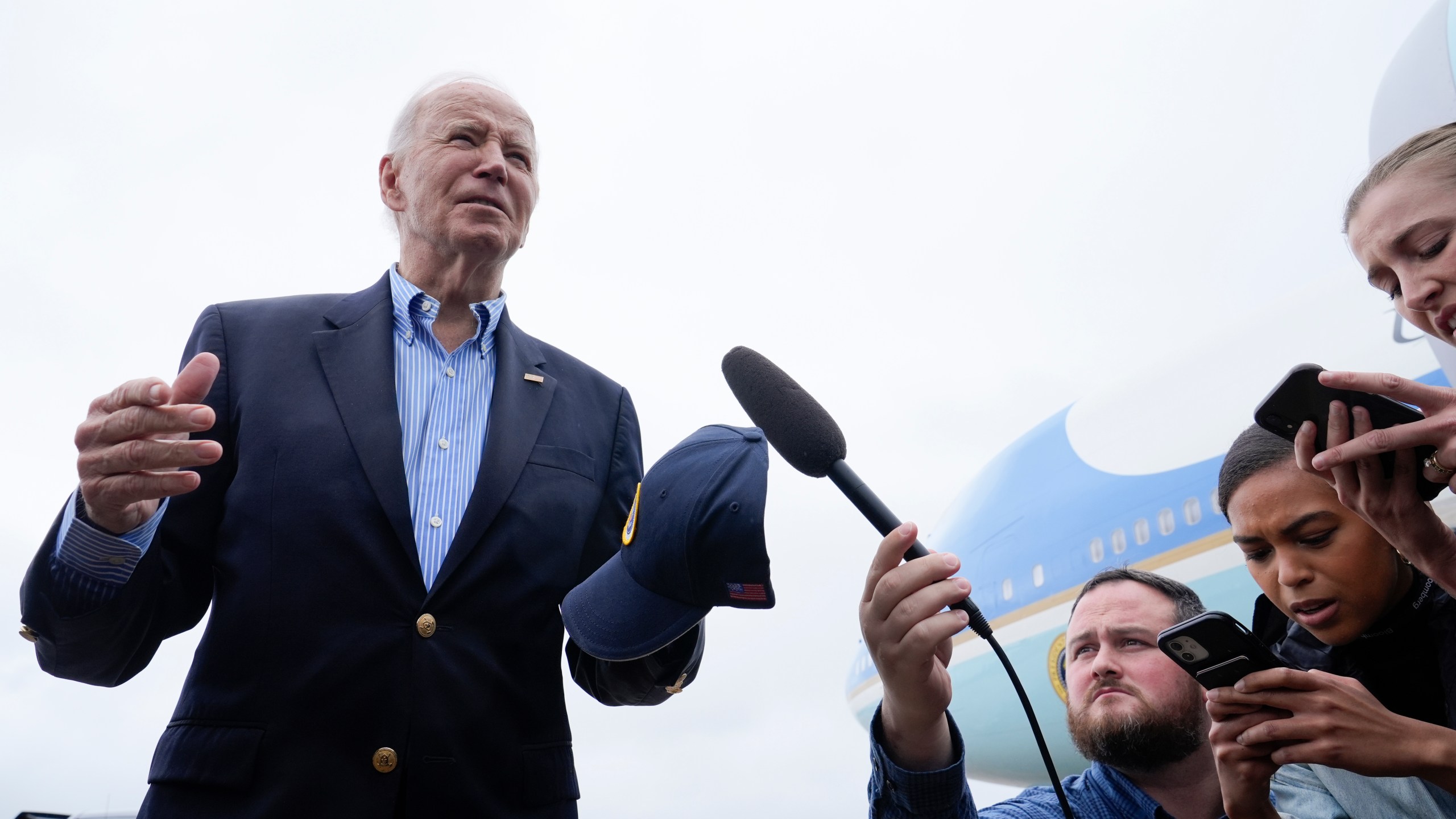 President Joe Biden speaks to the media before boarding Air Force One at Joint Base Andrews, Md., Wednesday, Oct. 2, 2024, as he heads to North and South Carolina to survey damage from Hurricane Helene. (AP Photo/Susan Walsh)