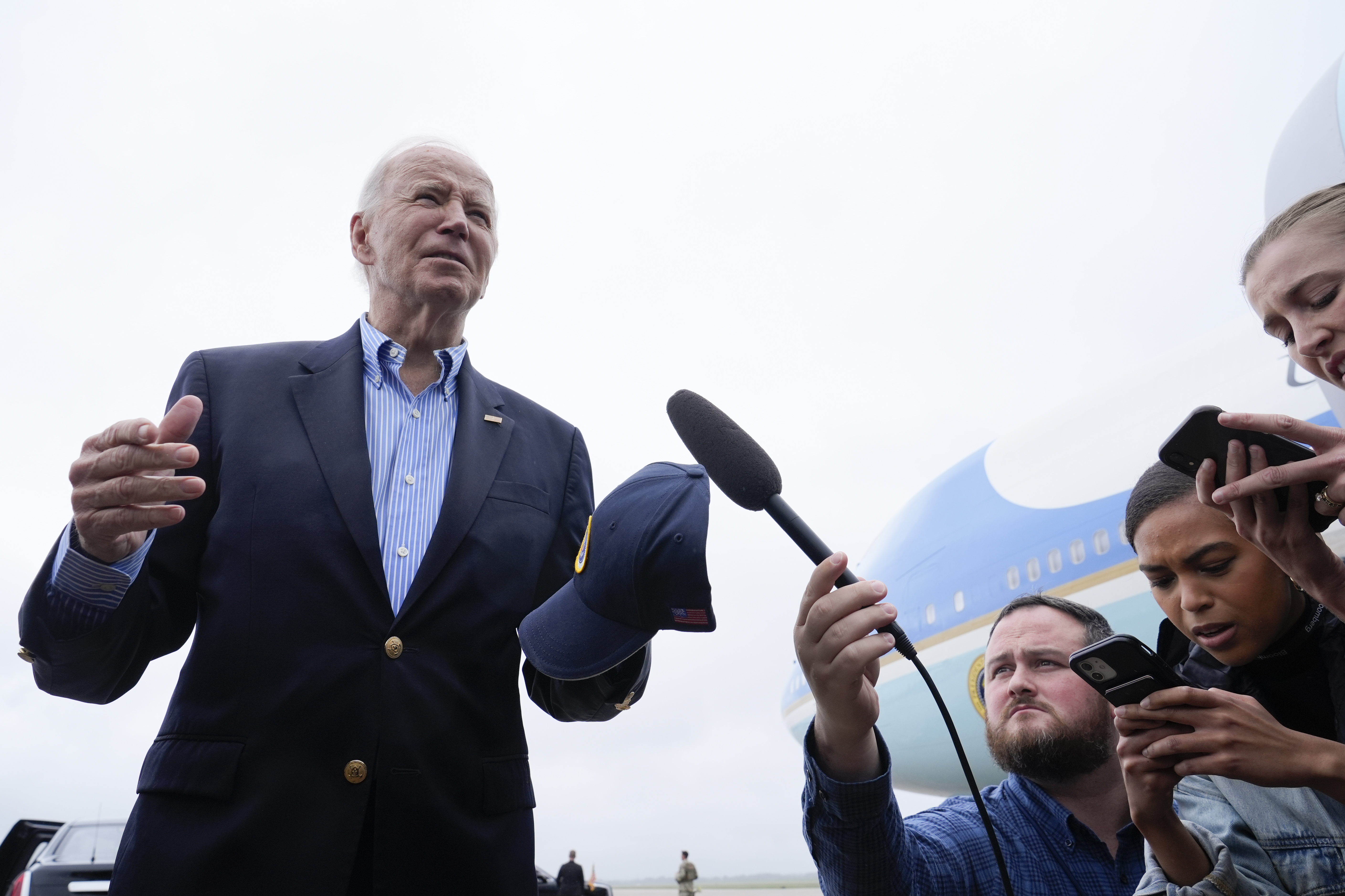 President Joe Biden speaks to the media before boarding Air Force One at Joint Base Andrews, Md., Wednesday, Oct. 2, 2024, as he heads to North and South Carolina to survey damage from Hurricane Helene. (AP Photo/Susan Walsh)