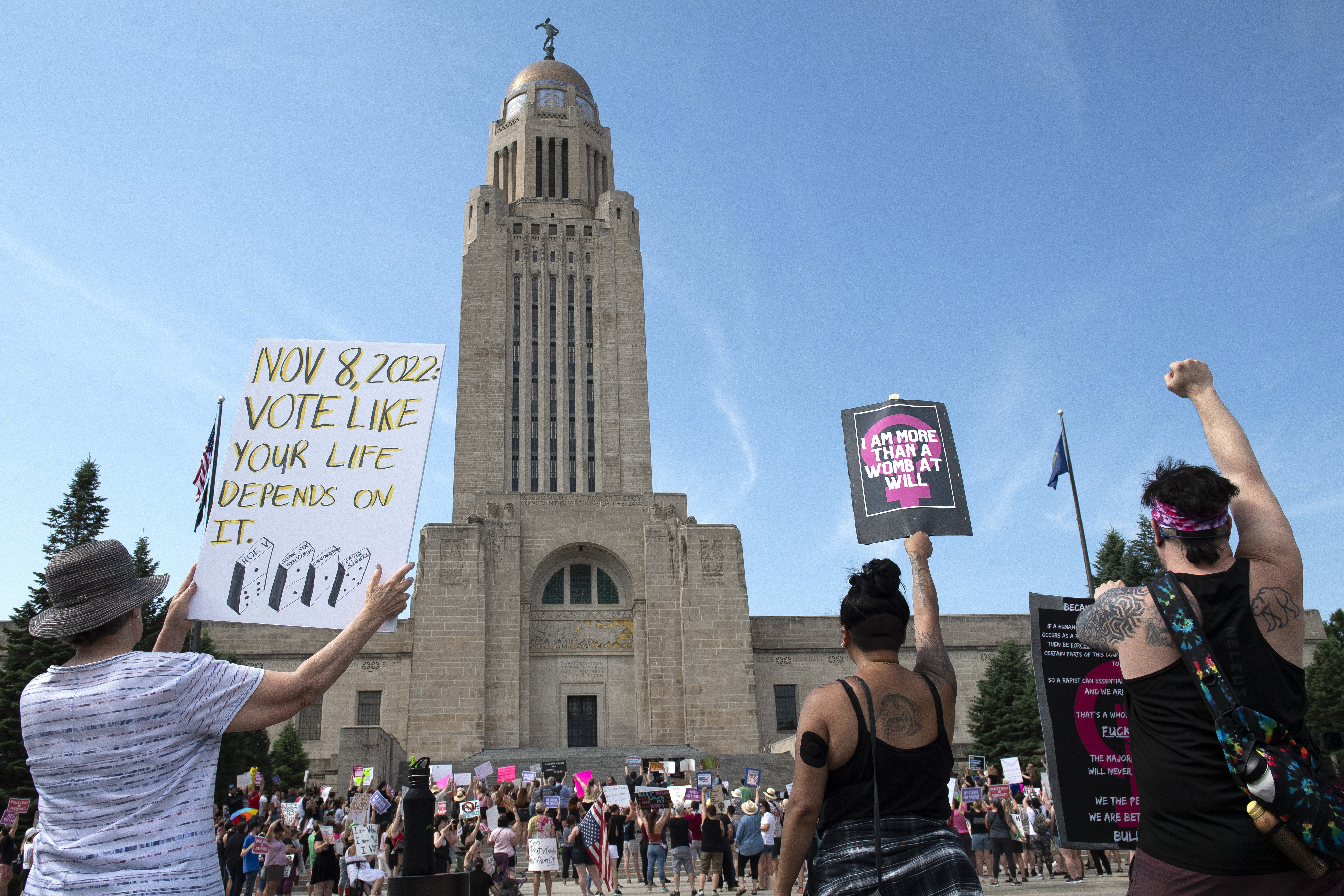 FILE - Protesters line the street around the front of the Nebraska Capitol during an Abortion Rights Rally, July 4, 2022, in Lincoln, Neb. (Kenneth Ferriera/Lincoln Journal Star via AP, File)