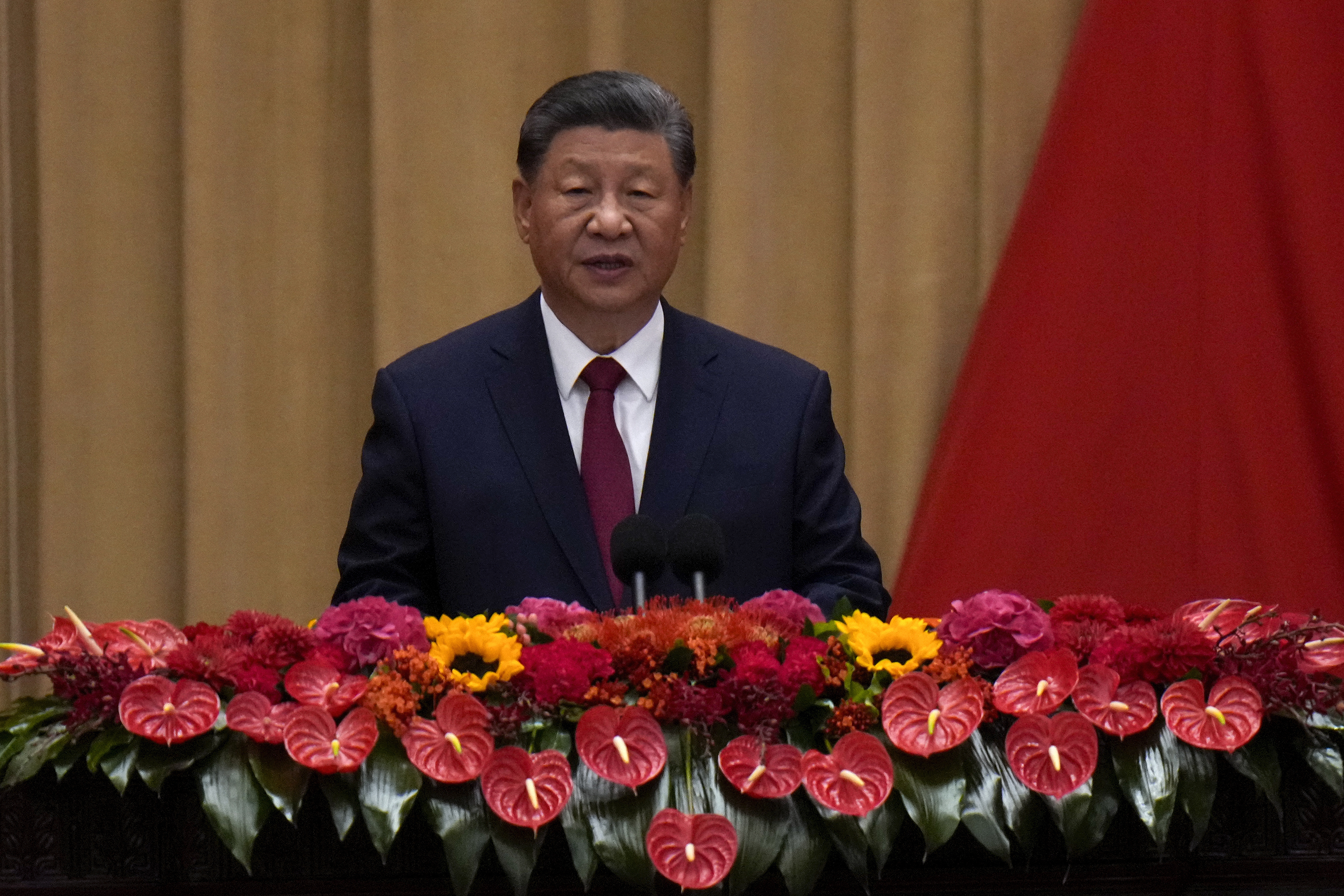 Chinese President Xi Jinping delivers his speech at a dinner marking the 75th anniversary of the founding of the People's Republic of China, at the Great Hall of the People in Beijing, Monday, Sept. 30, 2024. (AP Photo/Andy Wong)