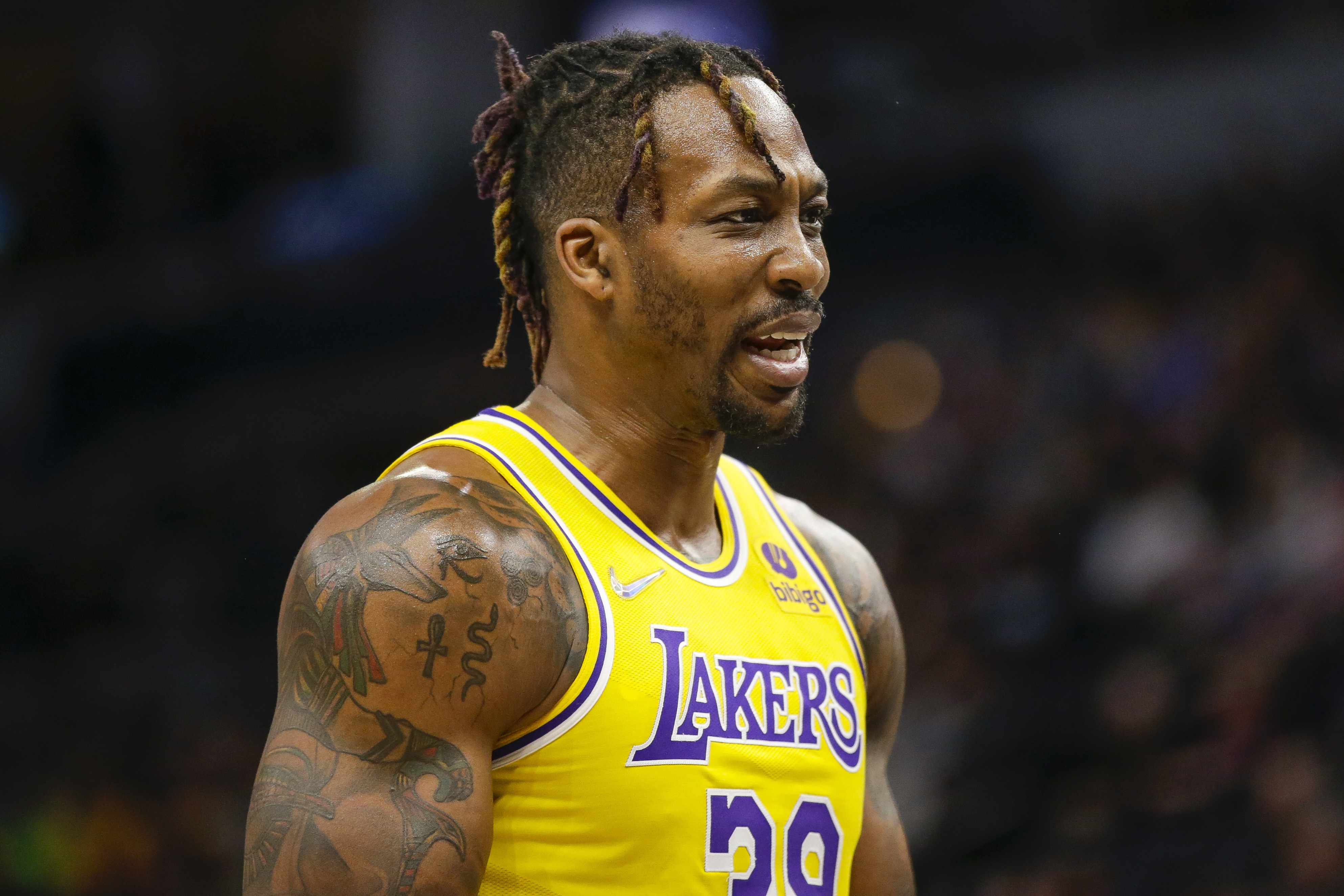 FILE - Los Angeles Lakers center Dwight Howard looks on during an NBA basketball game against the Minnesota Timberwolves, March 16, 2022, in Minneapolis. (AP Photo/Andy Clayton-King, File)