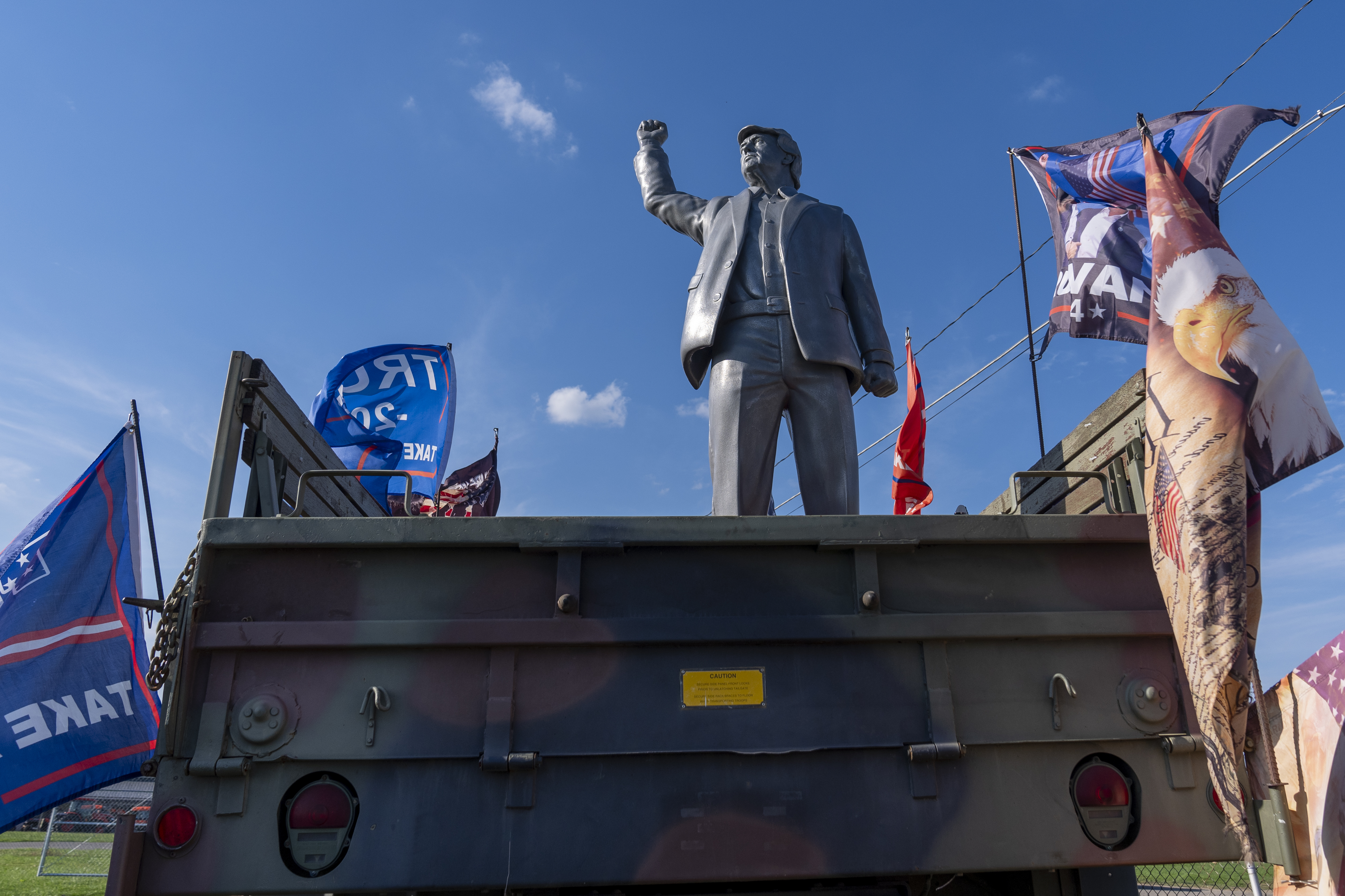 A statue of Republican presidential nominee former President Donald Trump is set up on a truck ahead of a campaign event at the Butler Farm Show, Friday, Oct. 4, 2024, in Butler, Pa. (AP Photo/Alex Brandon)