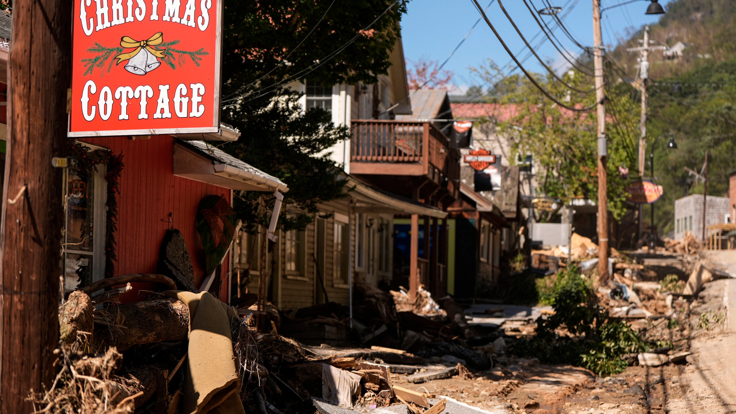 Business are seen in a debris field in the aftermath of Hurricane Helene, Wednesday, Oct. 2, 2024, in Chimney Rock Village, N.C. (AP Photo/Mike Stewart)