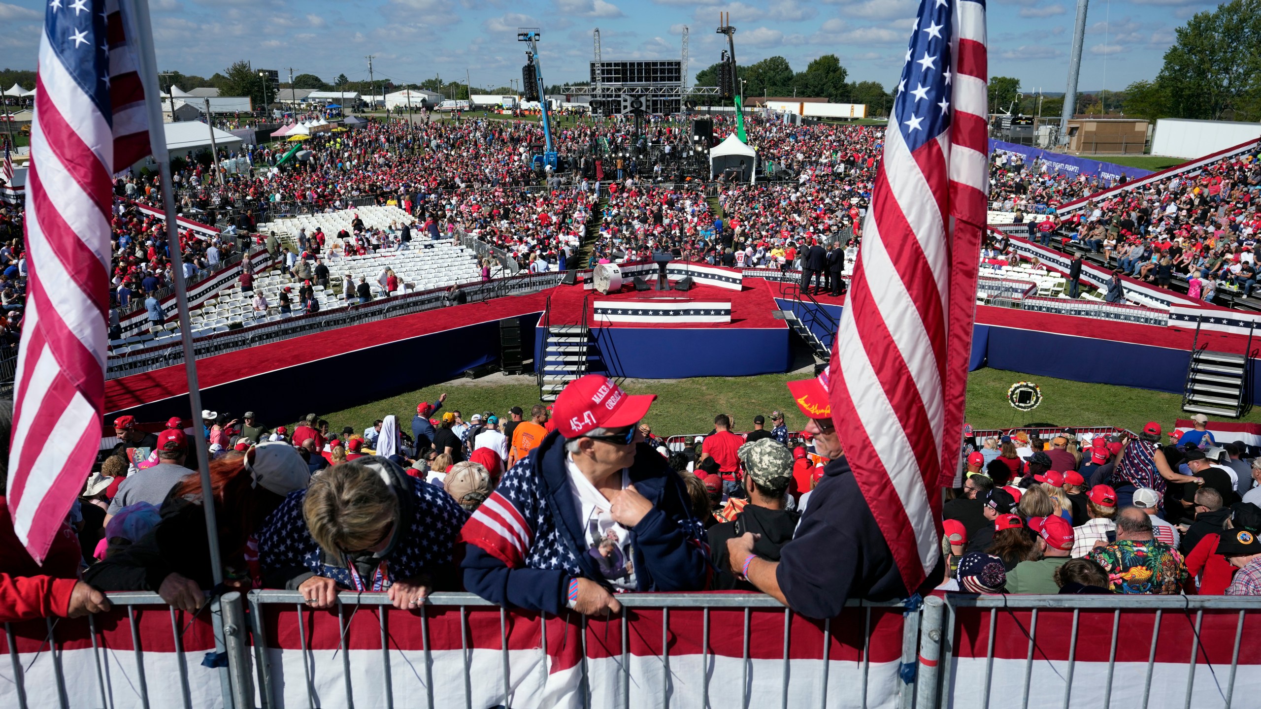 Supporters arrive before Republican presidential nominee former President Donald Trump speaks at a campaign rally at the Butler Farm Show, the site where a gunman tried to assassinate him in July, Saturday, Oct. 5, 2024, in Butler, Pa. (AP Photo/Alex Brandon)