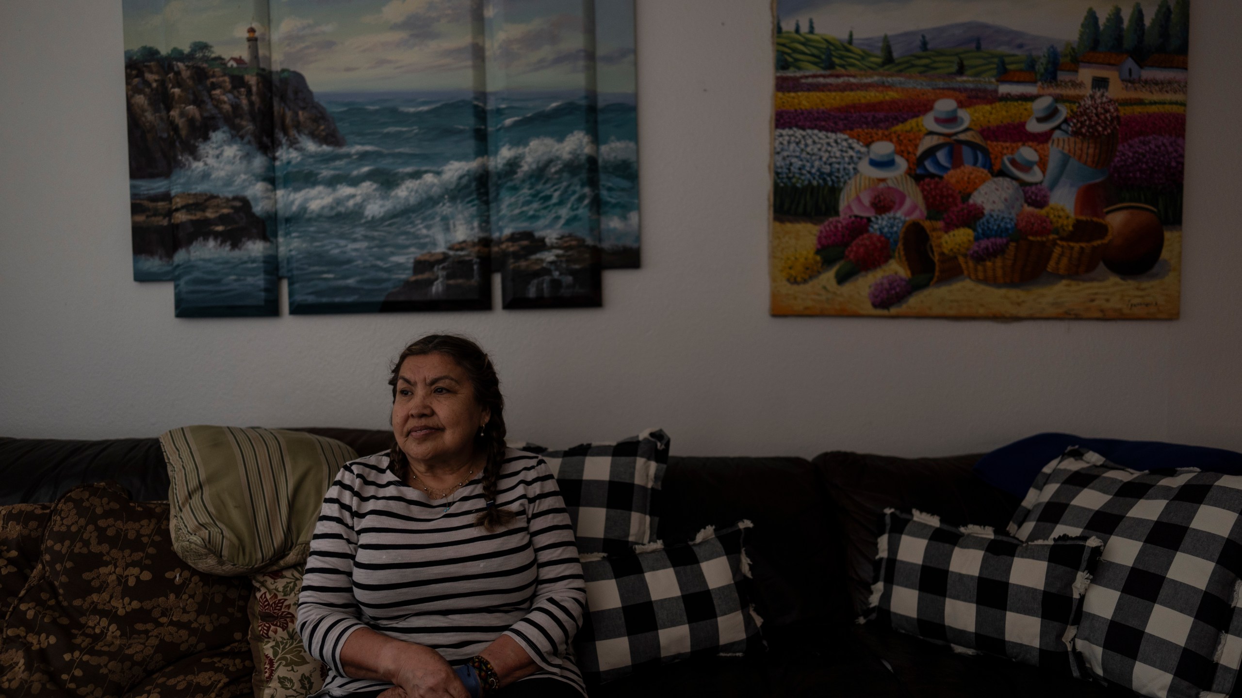 Marina Maalouf, a longtime resident of Hillside Villa, sits for a photo in her apartment in Los Angeles, Tuesday, Oct. 1, 2024. (AP Photo/Jae C. Hong)