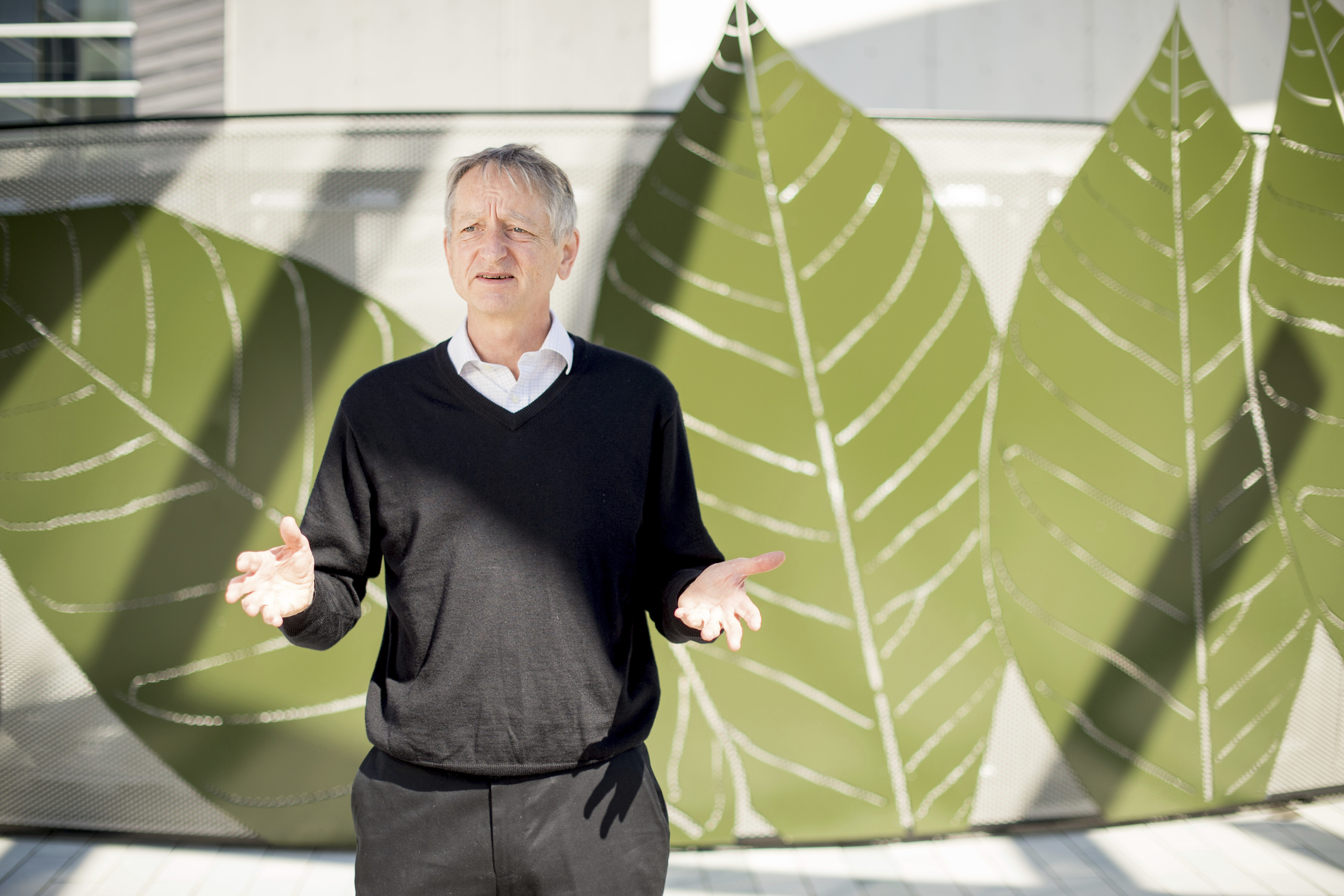 Computer scientist Geoffrey Hinton, who studies neural networks used in artificial intelligence applications, poses at Google's Mountain View, Calif, headquarters on Wednesday, March 25, 2015. (AP Photo/Noah Berger)