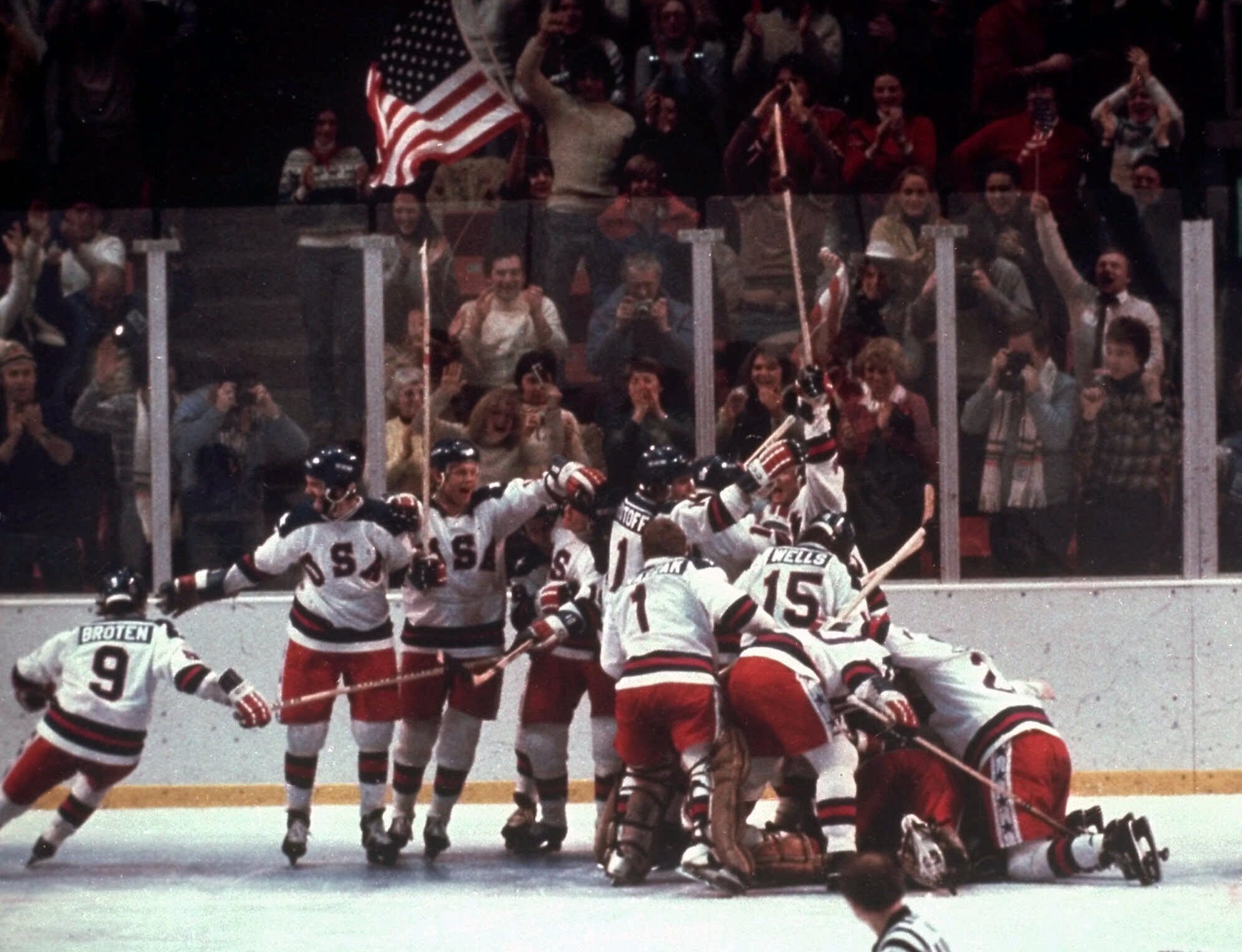 FILE - In this Feb. 22, 1980, file photo, the U.S. hockey team celebrates with goalie Jim Craig after a 4-3 victory against the Soviet Union in a medal round match at the the 1980 Winter Olympics in Lake Placid, N.Y. (AP Photo/File)