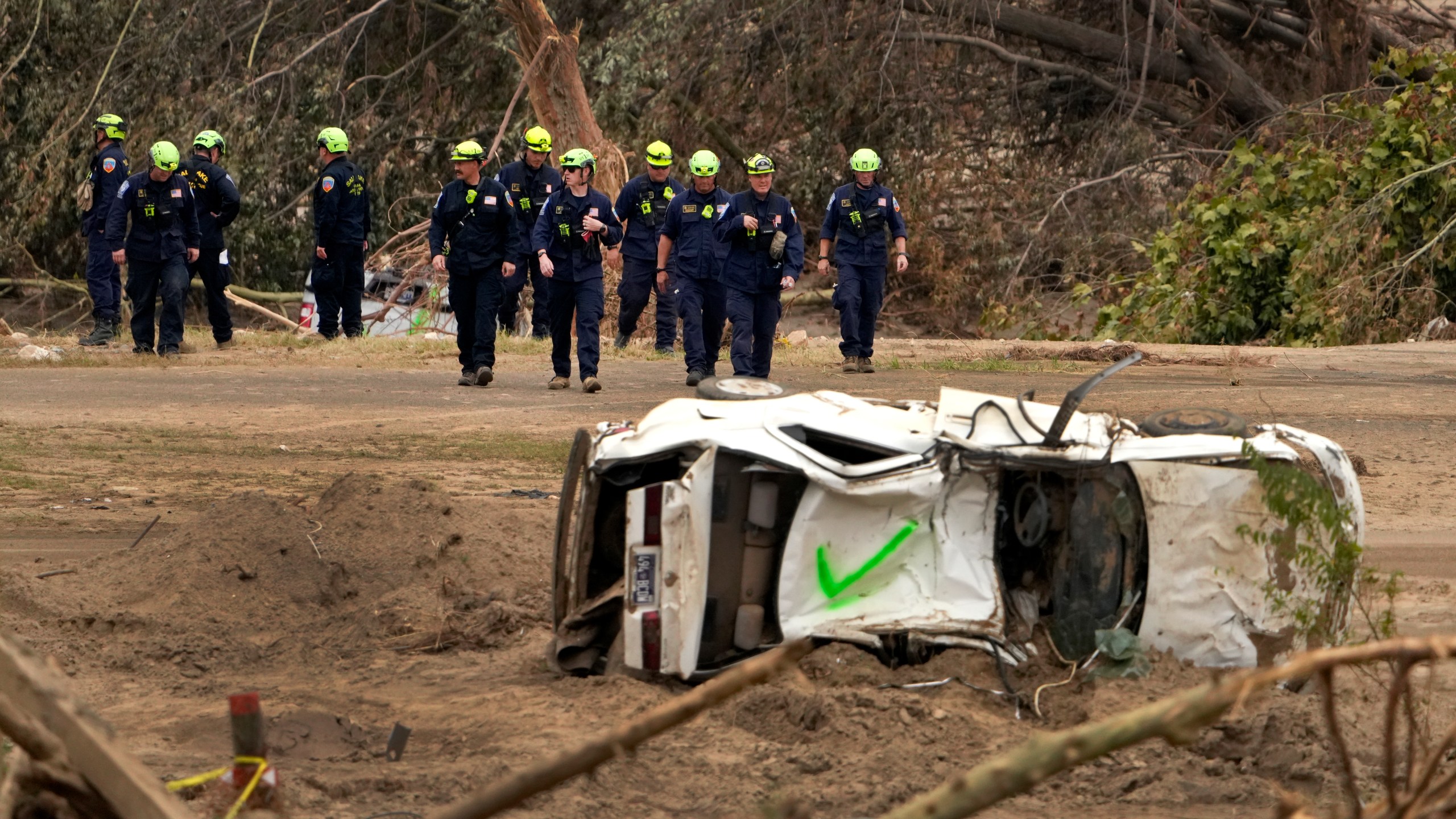 FILE - Personnel from Urban Search and Rescue Utah Task Force 1 work in the aftermath of Hurricane Helene, Friday, Oct. 4, 2024, in Erwin, Tenn. (AP Photo/Jeff Roberson, File)