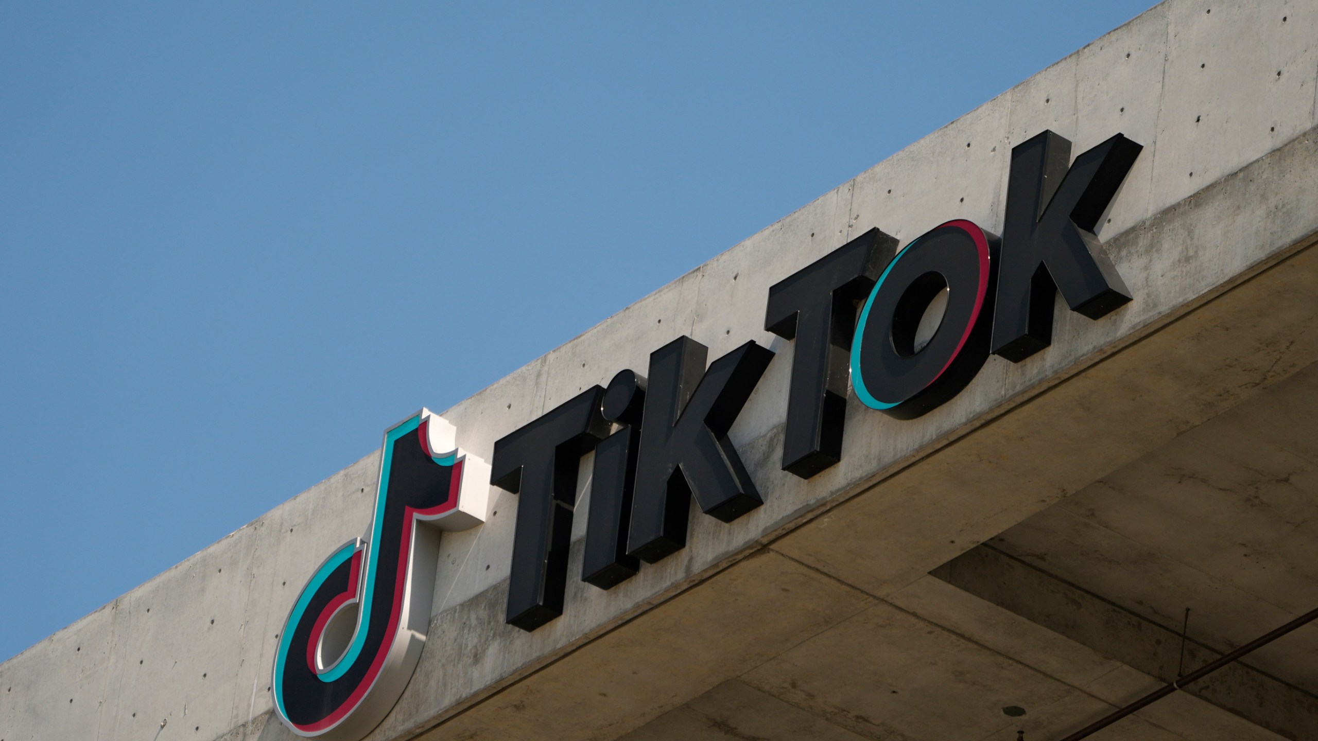 FILE - The TikTok logo is seen on their building in Culver City, Calif., March 11, 2024. (AP Photo/Damian Dovarganes, File)