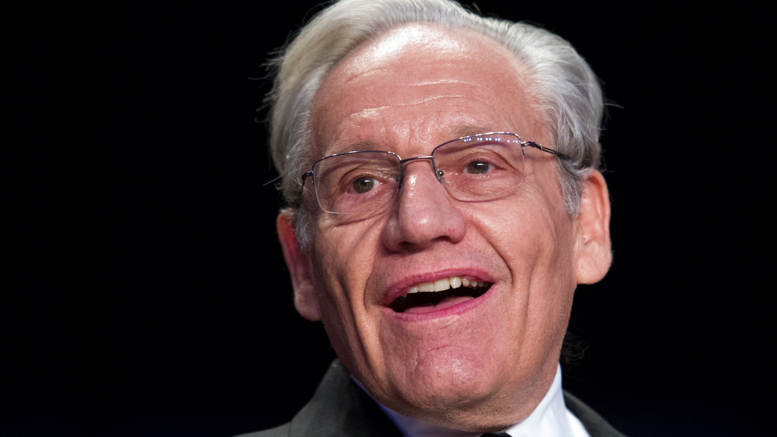 FILE - In this April 29, 2017, file photo journalist Bob Woodward sits at the head table during the White House Correspondents' Dinner in Washington. (AP Photo/Cliff Owen, File)