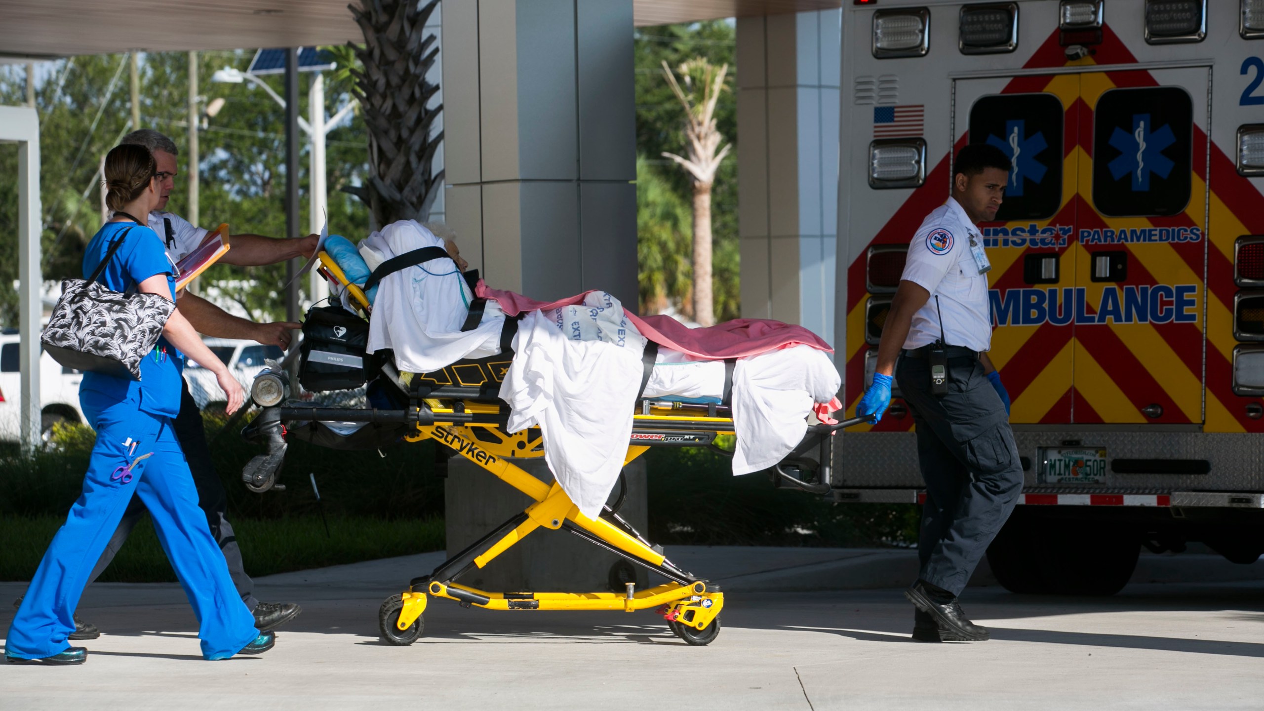 FILE - Patients are evacuated from Palms of Pasadena Hospital in South Pasadena, Fla. on Friday, Sept. 8, 2017, as Hurricane Irma approaches. (Eve Edelheit/Tampa Bay Times via AP, File)