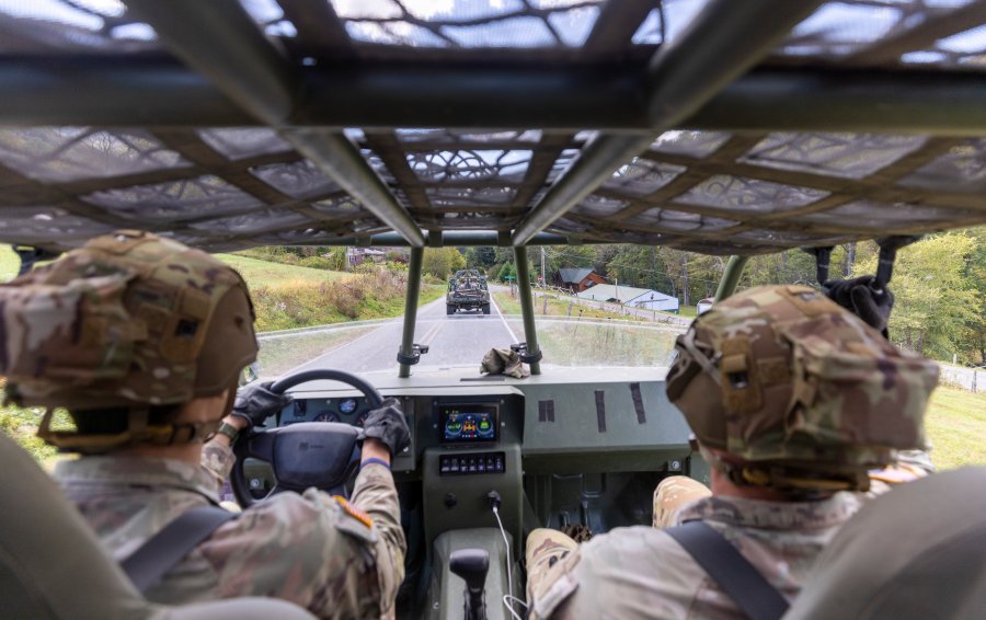 Soldiers with the 101st Airborne Division Air Assault, 2nd Brigade Combat Team, from Fort Campbell, Kentucky, use Infantry Squad Vehicles to deliver water, food, toiletries, and other aid to residents in the Soco Gap community in Maggie Valley on Tuesday, Oct. 8, 2024. The team has been using the Maggie Valley Pavilion and Town Hall as a distribution base for relief efforts in the town following Tropical Storm Helene. (Travis Long/The News & Observer via AP)