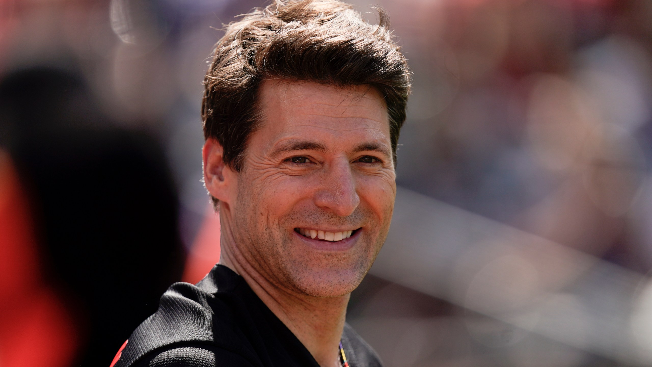 FILE - Tony Dokoupil, co-host of "CBS This Morning", looks on before throwing a ceremonial first pitch prior to a baseball game between the Baltimore Orioles and the Texas Rangers, May 27, 2023, in Baltimore. (AP Photo/Julio Cortez, File)