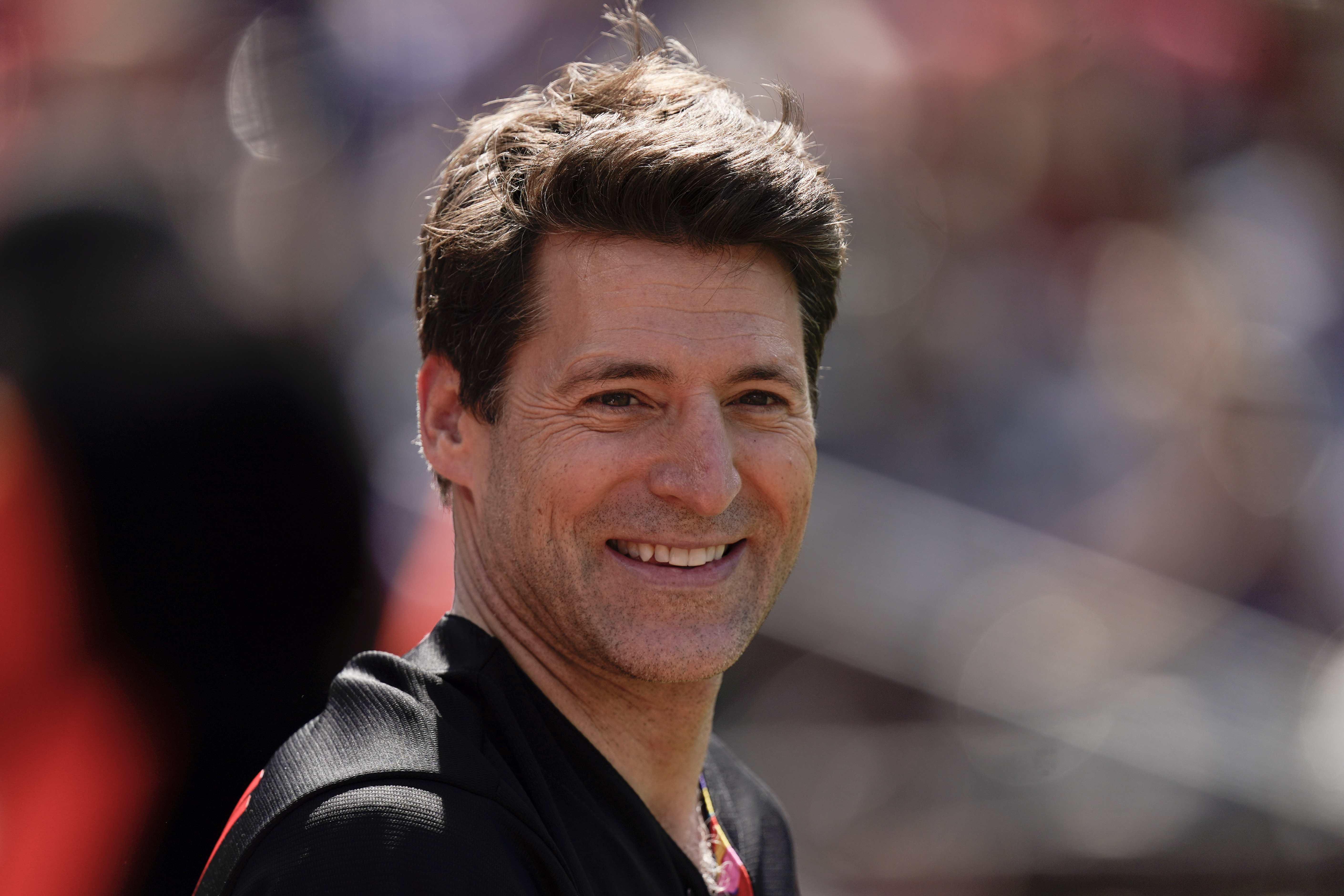 FILE - Tony Dokoupil, co-host of "CBS This Morning", looks on before throwing a ceremonial first pitch prior to a baseball game between the Baltimore Orioles and the Texas Rangers, May 27, 2023, in Baltimore. (AP Photo/Julio Cortez, File)