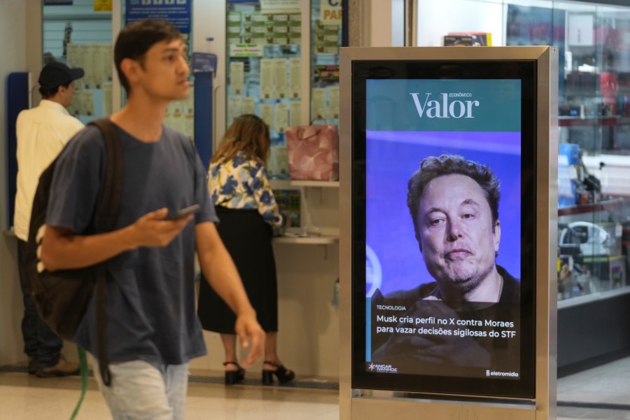 FILE - An ad by Valor media shows a photo of Elon Musk at a shopping center in Brasilia, Brazil, Monday, Sept. 2, 2024. (AP Photo/Eraldo Peres, File)