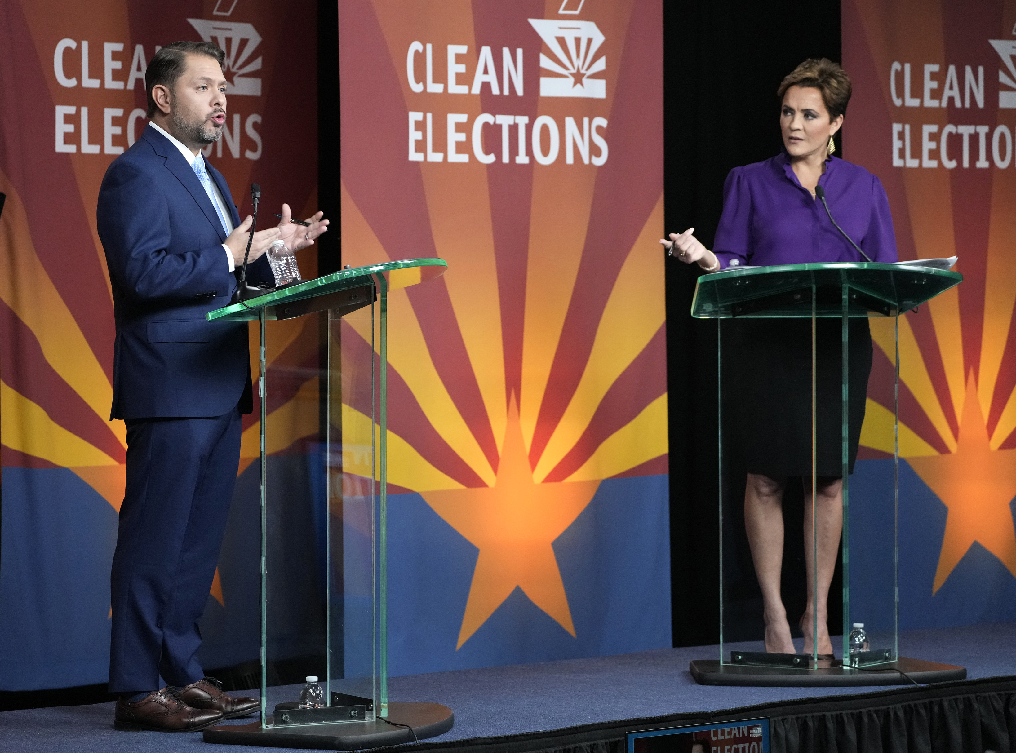 U.S. Senate candidates Rep. Ruben Gallego, D-Ariz., left, and Republican challenger Kari Lake participate in their debate, Wednesday, Oct. 9, 2024, in Phoenix. (Cheryl Evans/Arizona Republic via AP)