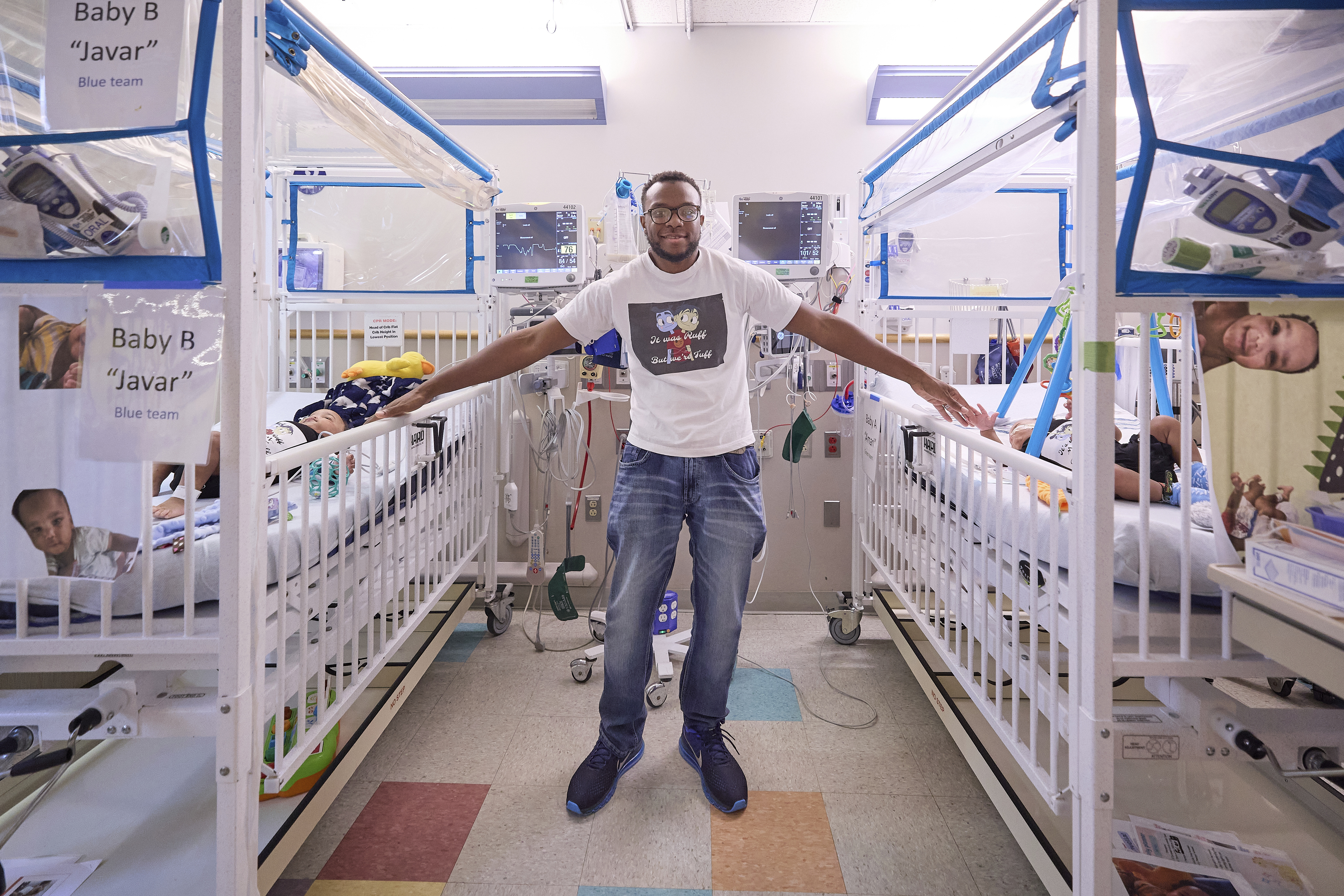 This undated photo provided by the Children’s Hospital of Philadelphia in October 2024 shows Tim Ruffin with his previously conjoined twins, after eparation surgery at the Children’s Hospital of Philadelphia. (Ed Cunicelli/Children’s Hospital of Philadelphia via AP)