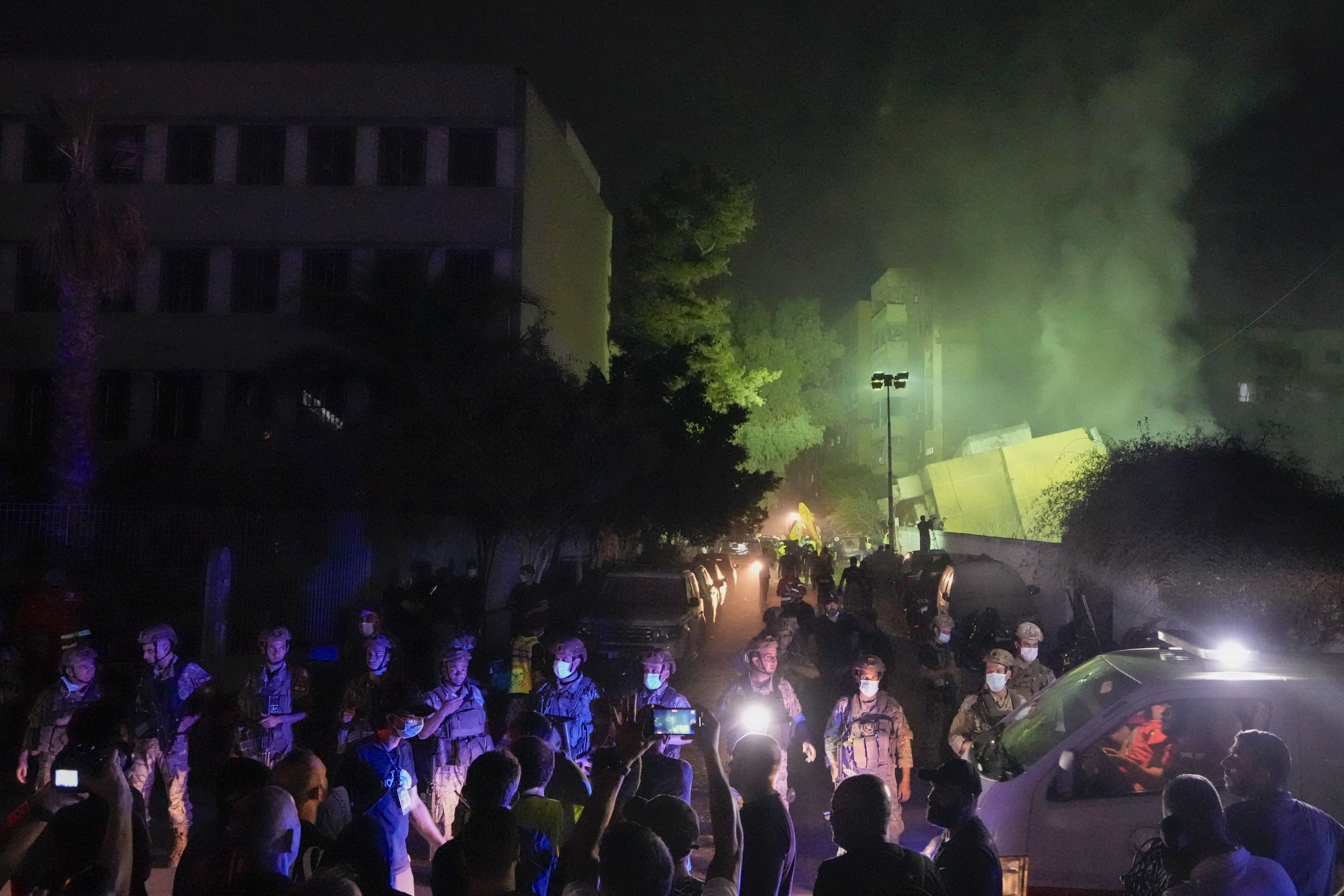 FILE - Lebanese soldiers secure the area at the site of an Israeli airstrike in Beirut's southern suburbs on Sept. 27, 2024. (AP Photo/Bilal Hussein, File)